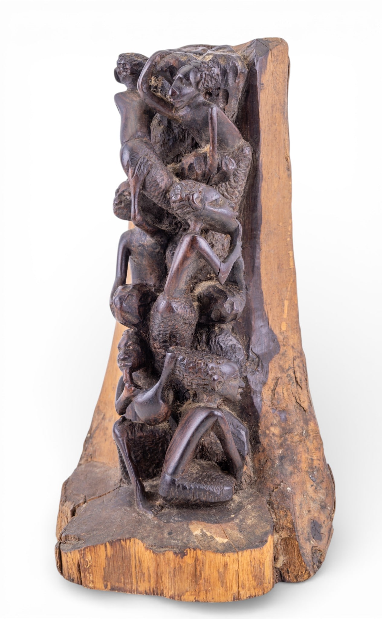 Carved African Makonde Tree of Life Sculpture: An African wood carved sculpture known as a Makonde Tree of Life carving or Ujamaa from Tanzania and Mozambique, measures approx. 6" W x 6" D x 11" H.