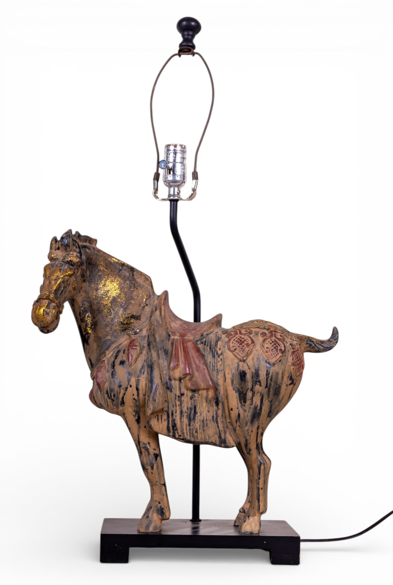 Figural Horse Table Lamp on Black Base: Table lamp featuring a horse figure composed of composite material with painted details. The horse is designed with a saddle and decorative elements, placed on a rectangular black base. Measures