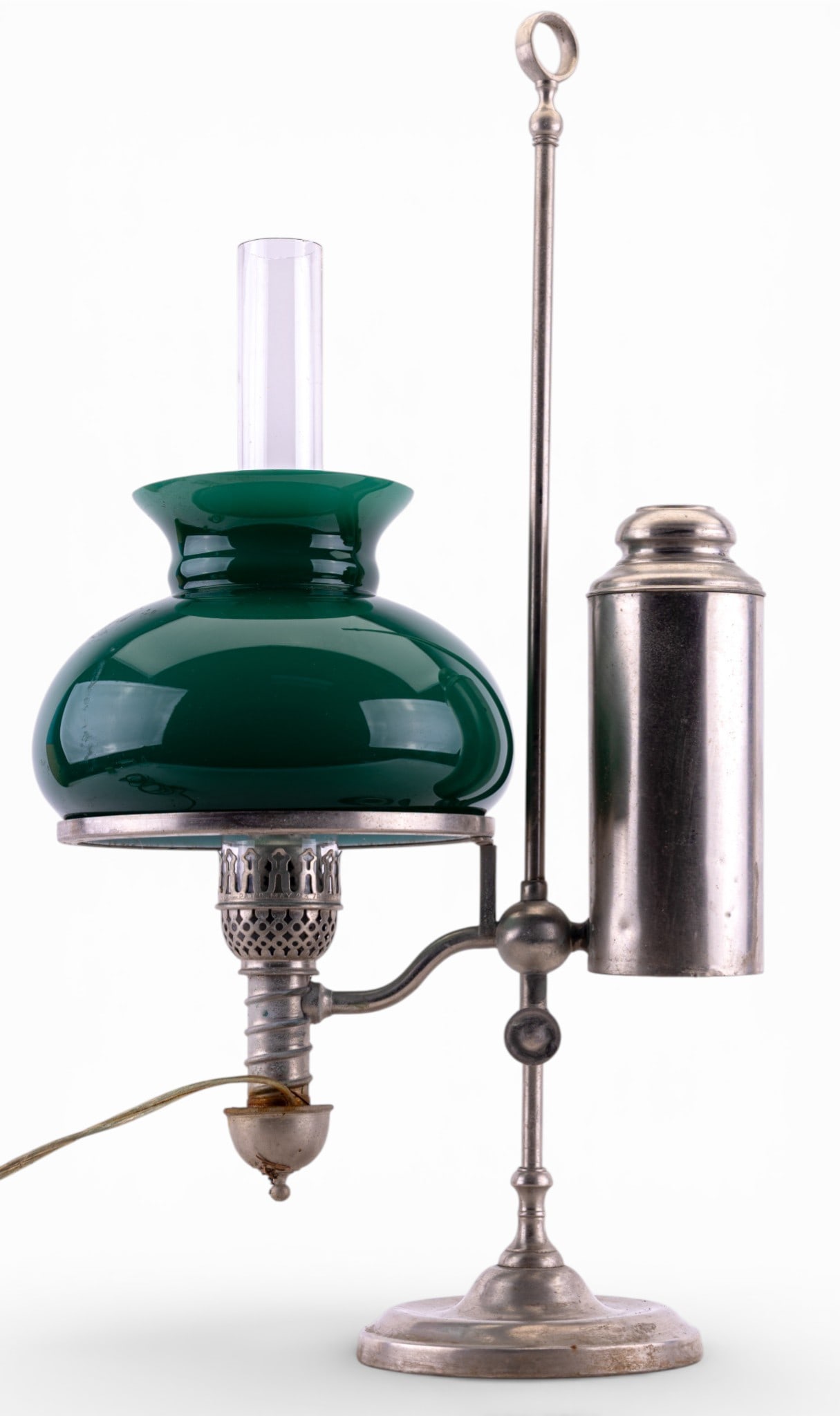 Manhattan Brass Silver Tone Student Lamp: A vintage Manhattan Brass silver tone student lamp with green and white cased shade and clear glass hurricane shade, untested, measures approx. 12" W x 23" H.