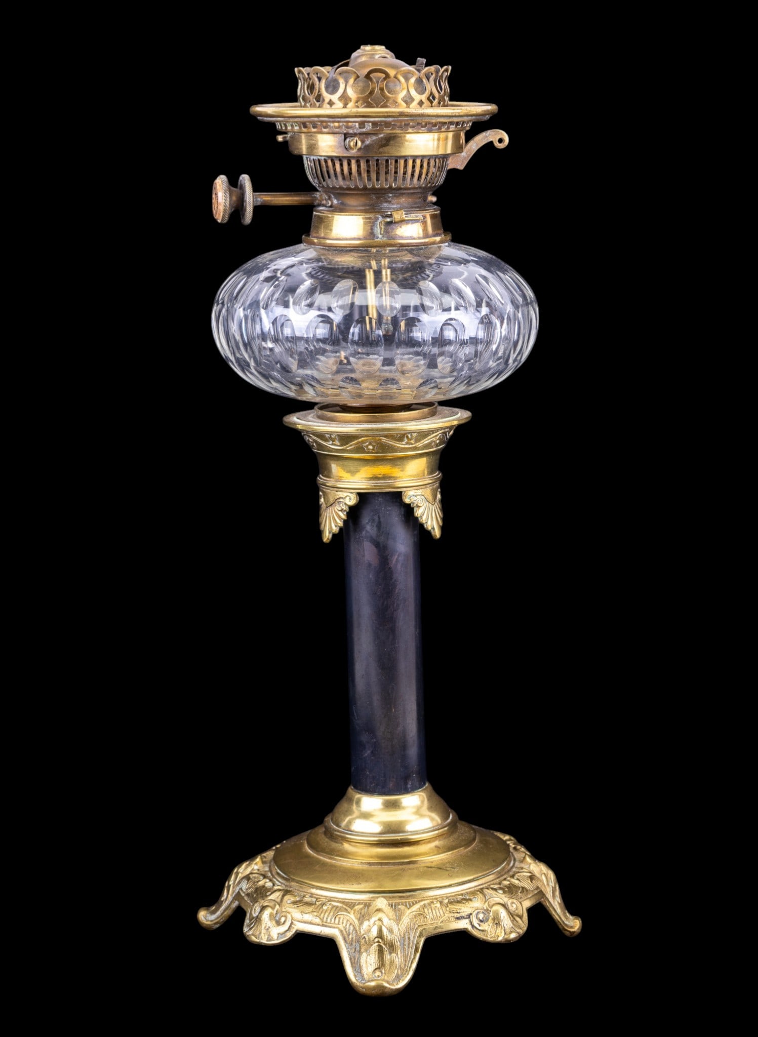 19th C Bronze Oil Lamp: A 19th century oil lamp with bronze accents measuring approx. 17" high. Switch reads "Hincks Duplex No. 2". Lamp is in very good condition, no noticeable structural damage to glass or hardware.