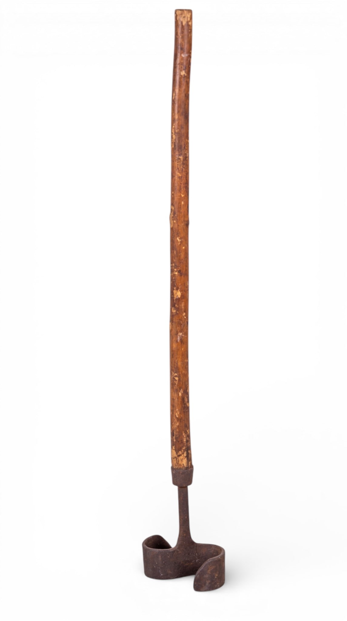 Antique Livestock Branding Iron: An antique livestock branding iron with wooden handle, brand depicts a capital 'S', note split wood section on the handle, measures approx. 32" H.