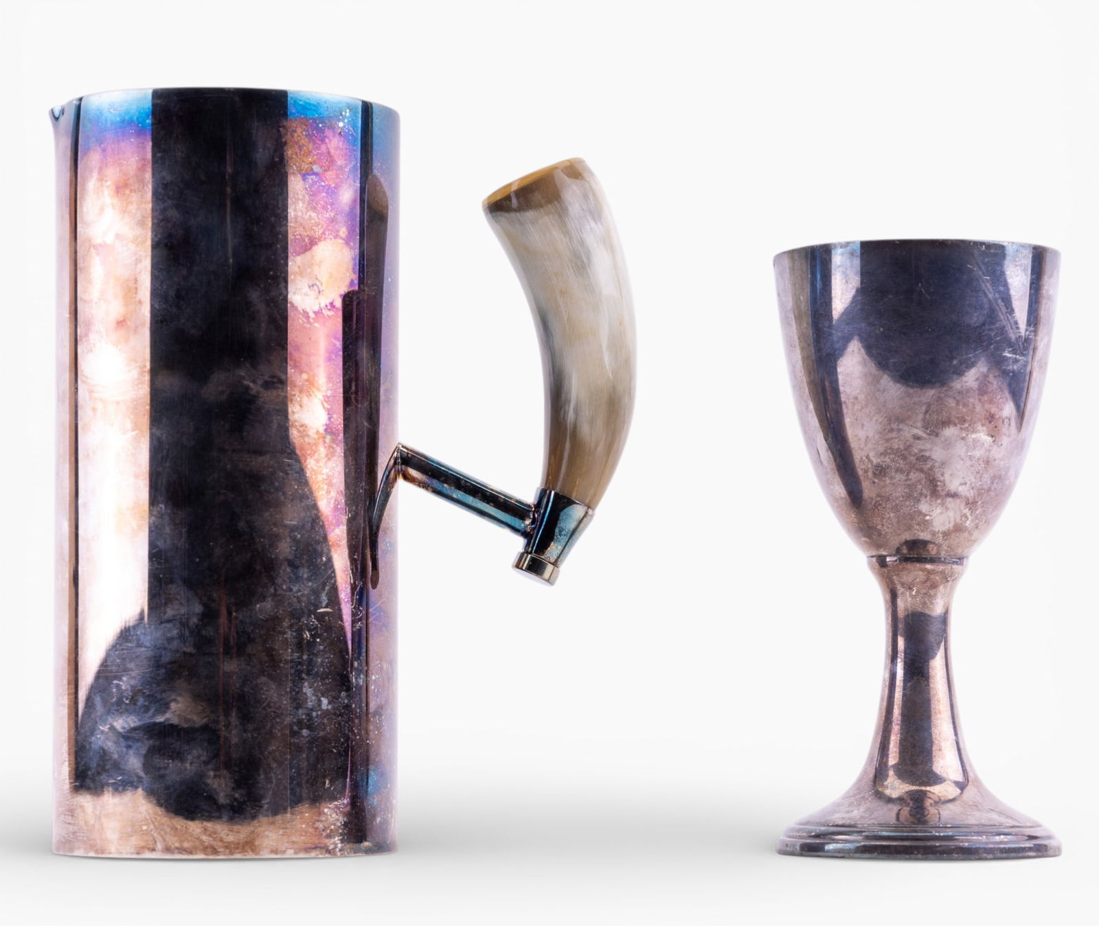 Unusual SP Argentina Pitcher, Other SP Goblet: Late 19th to early 20th Century Plata Lappas (Argentina) silver plated pitcher. Unusual form, with natural material handle. Pitcher measures approximately 8.75" H x 4" W. Lot also includes a silver pl