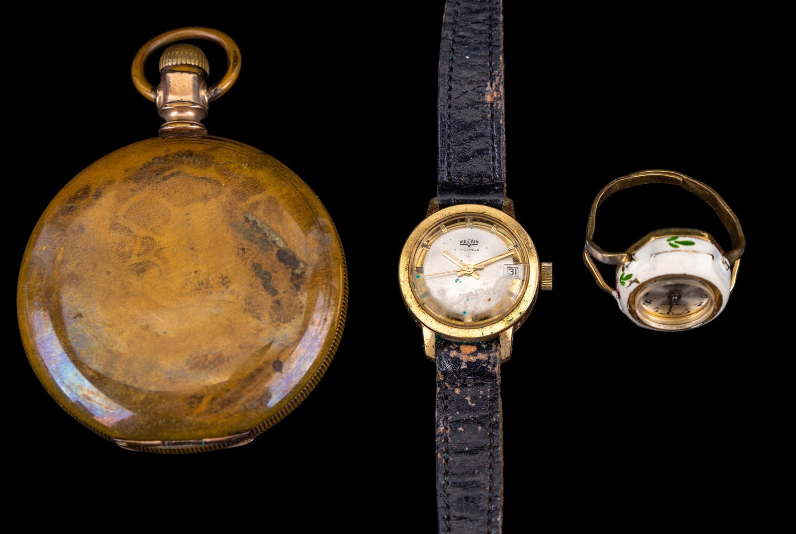 Vintage Watches: Includes a vintage ladies Vulcain wristwatch, an enamel 'ring' watch and an antique American Waltham pocketwatch. (all watches in as found condition).