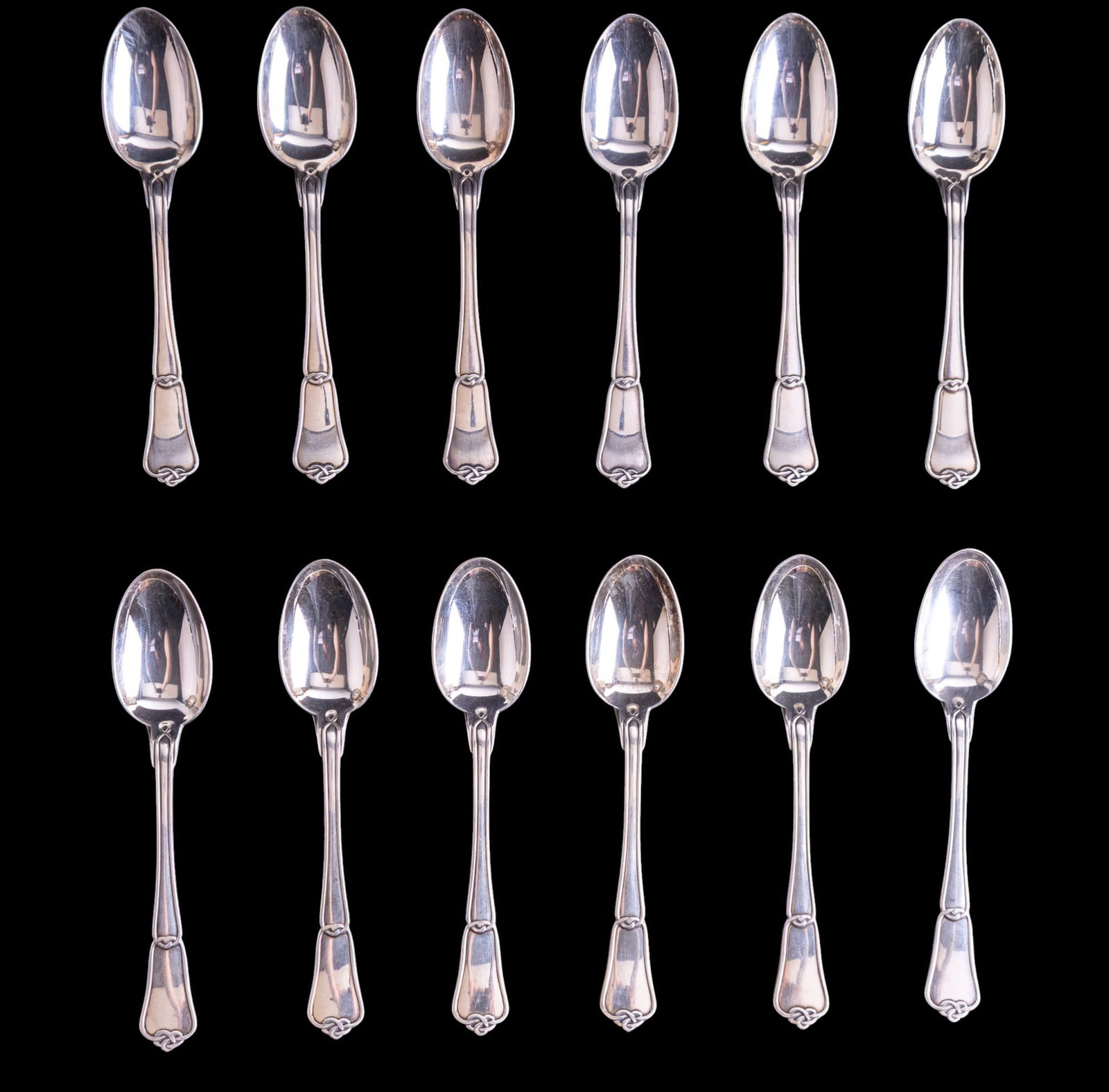 12 French .950 Silver Spoons, Poussielgue-Rusand: A set of 12 Alphonse Poussielgue-Rusand (French 1847-1891) French .950 silver spoons measuring approx. 4.125" L each, featuring a Minerva cartouche and maker's mark. Total approx. weight is 5.51 ozt.