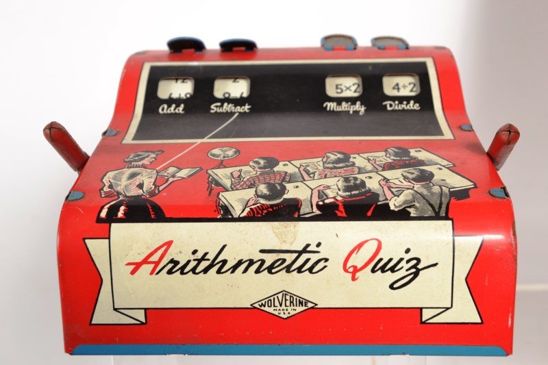 Arithmetic Quiz Toy and Wooden Puzzle Lot: Three wooden puzzles (two verified complete) along with a Wolverine Supply Company "Arithmetic Quiz" toy