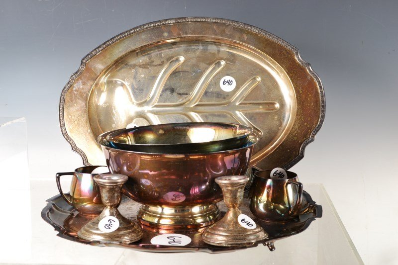 Grouping of Silver Plate and Sterling Items: Silver plate and sterling items includes a pair of weighted sterling silver candlesticks, a silver plated well and tree platter, a 9" silver plated bowl, and 8" silver plated bowl, and a pair of foldi