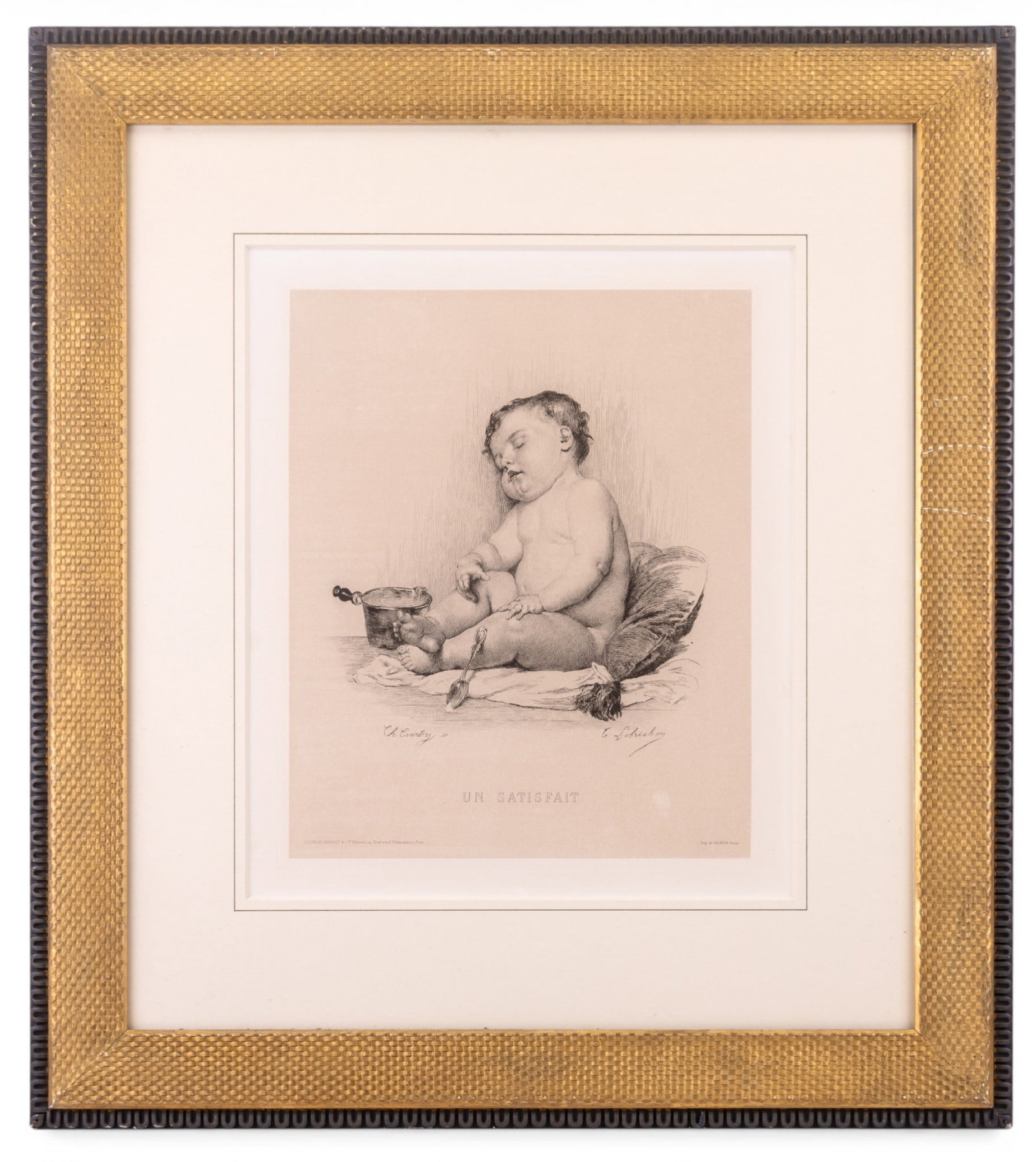 Early French Lithograph by Jourdon Barbot: Early French lithograph by Jourdon Barbot in an intricately carved two-tone wooden frame. Measures approx. 27.5" H x 24.5" W. Lithograph is titled 'Un Satisfait' and depicts a baby sleeping. Printed s