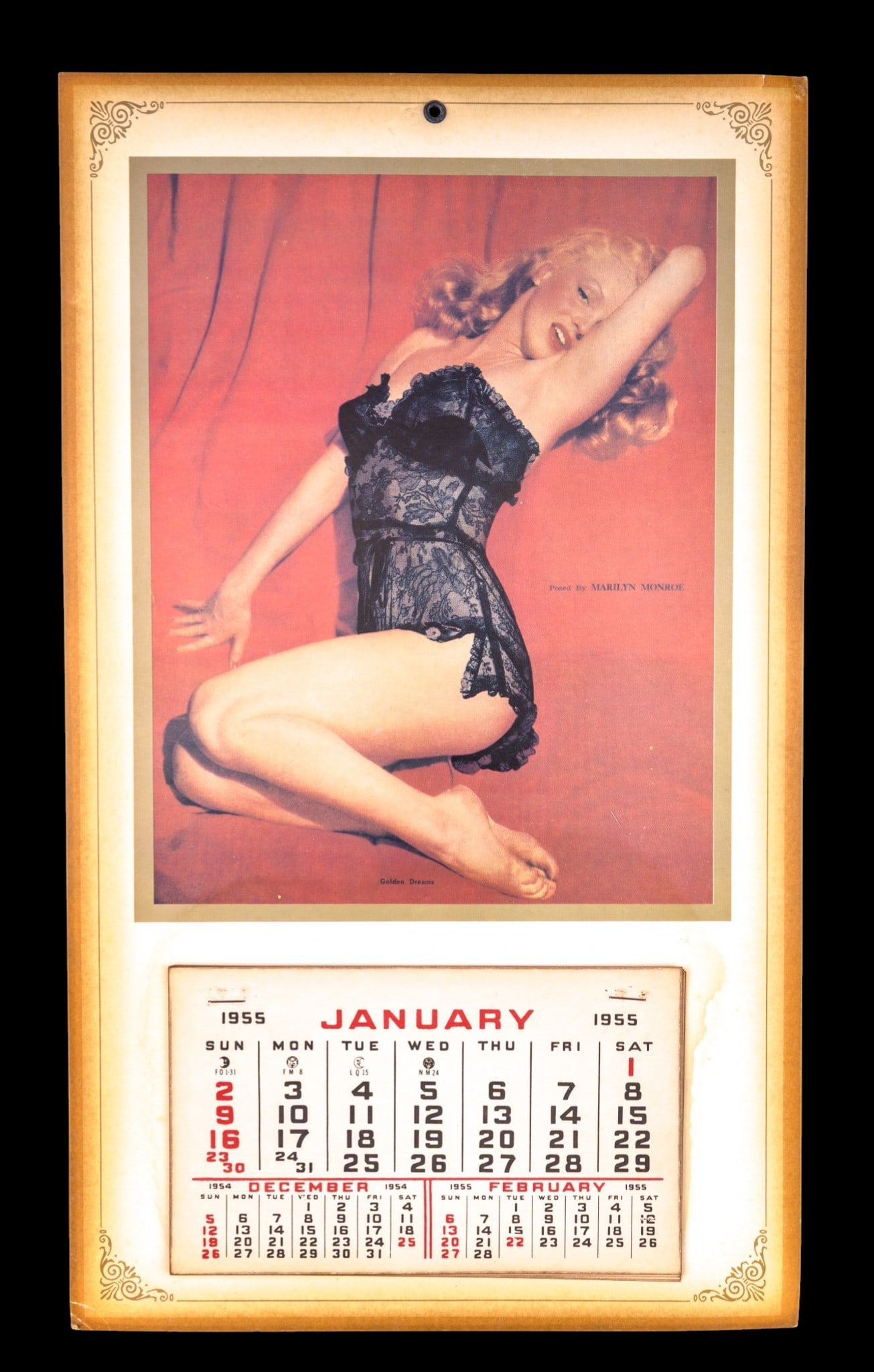 Vintage 1955 Marilyn Monroe Pin Up Calendar: A second original 1955 wall calendar featuring the "Golden Dreams" image of Marilyn Monroe, taken by Tom Kelley in 1949. Lithographic image is mounted above a 1955 tear-away calendar pad retaining wha
