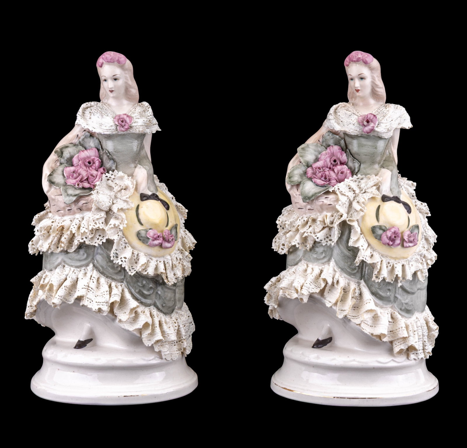 Dresden Lace Style Lady Figurines: A pair of cast porcelain lady figurines after Dresden style porcelain, note some chips and loss to lace, not signed, measure approx. 13" H.