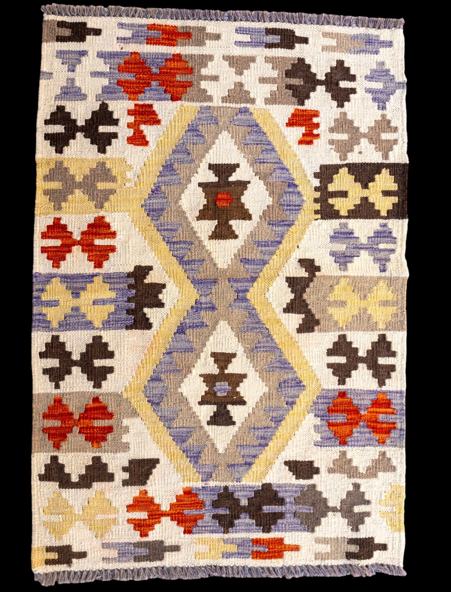 Handmade Geometric Design Rug: Handmade rug, measuring approx. 2'8" x 3'10".
