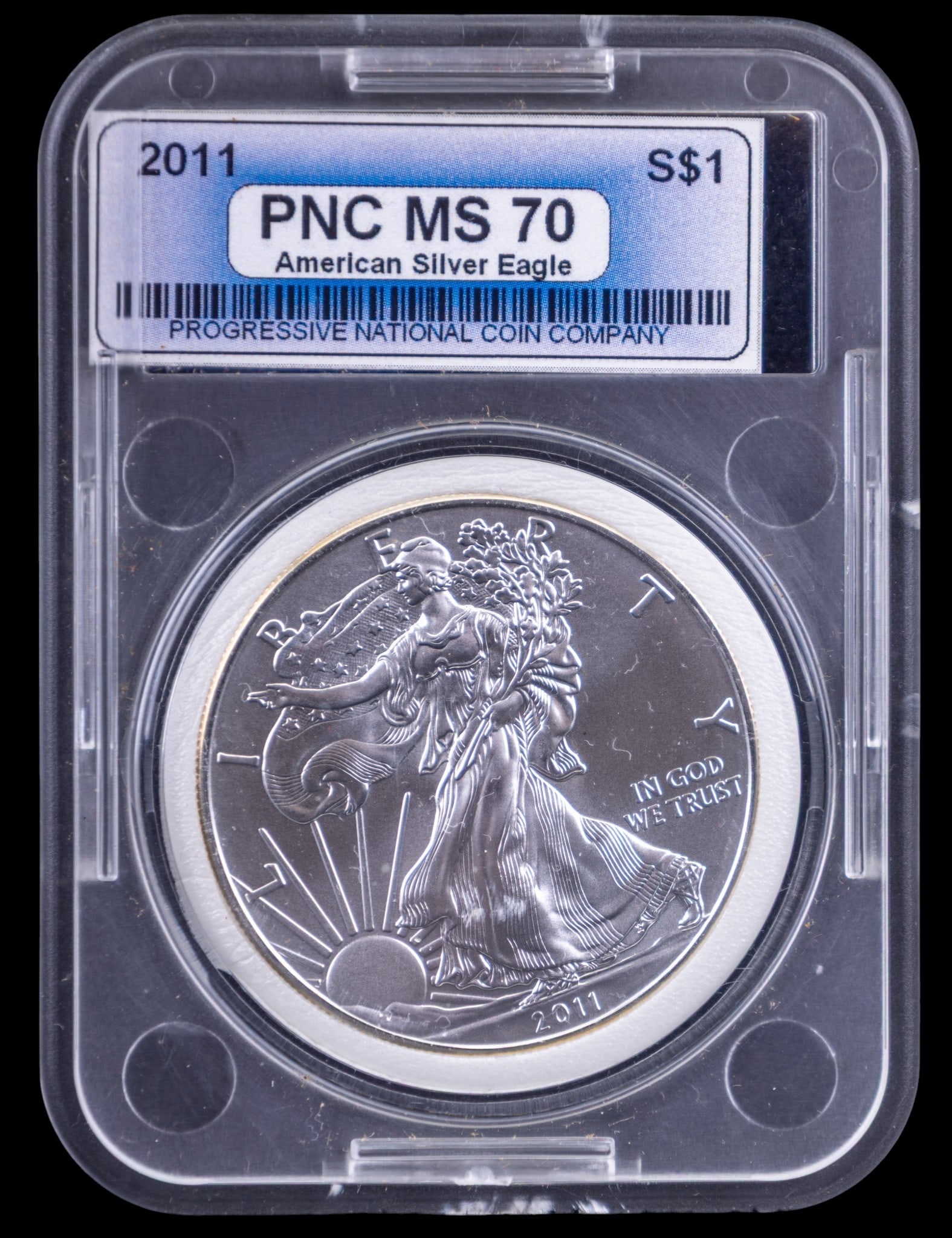 2011 American Silver Eagle Coin, MS 70: 2011 American Silver Eagle bullion coin, graded MS 70 by PNC. Encased in a protective slab with certification labels showing Guaranteed Authentic and MS 70 grade. Features iconic Walking Liberty desig