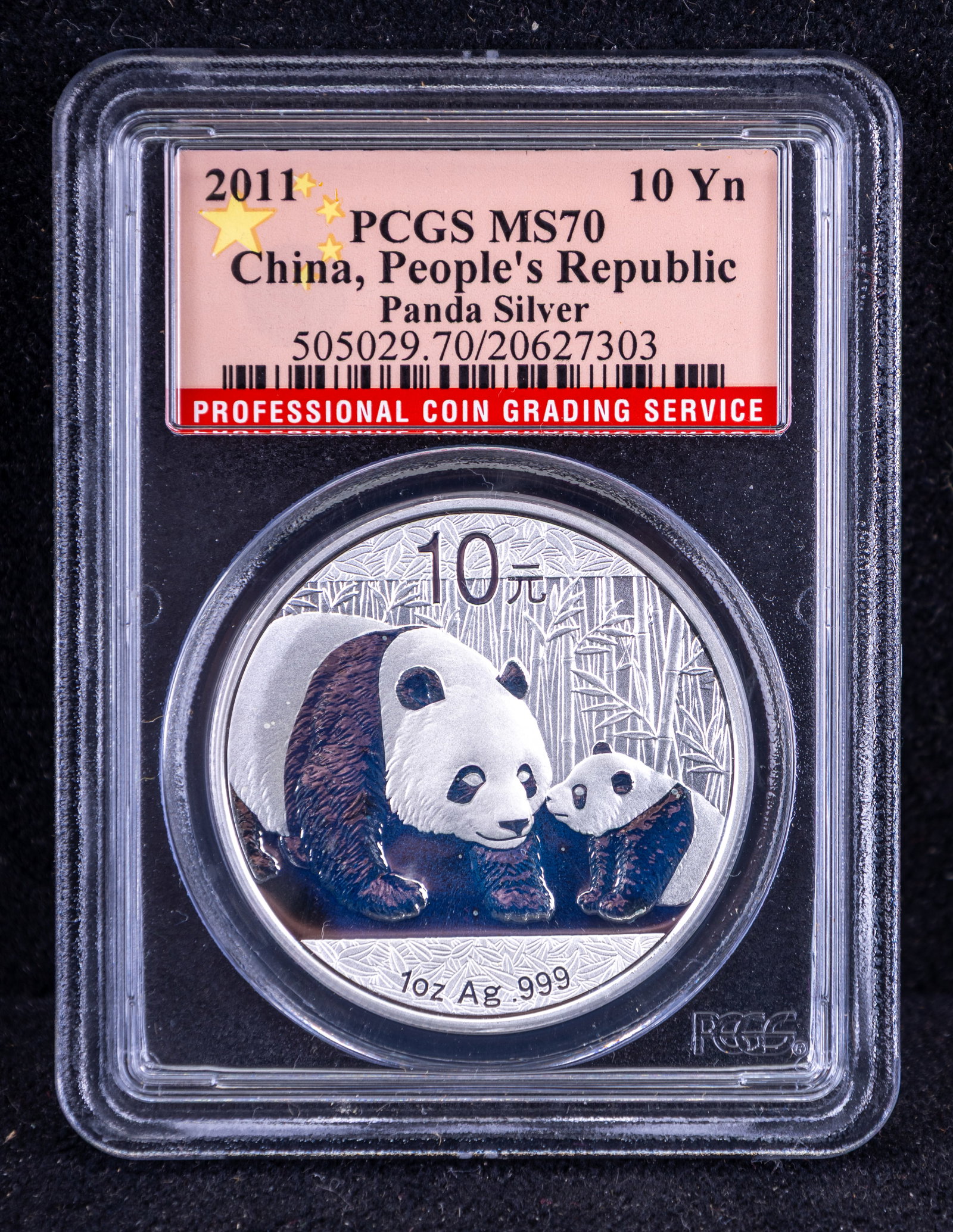 2011 China 10 Yuan Silver Panda Coin, PCGS MS70: 2011 China 10 Yuan silver Panda coin graded MS70 by the Professional Coin Grading Service (PCGS). Features the iconic design of pandas eating bamboo on the obverse and the Temple of Heaven with the ye