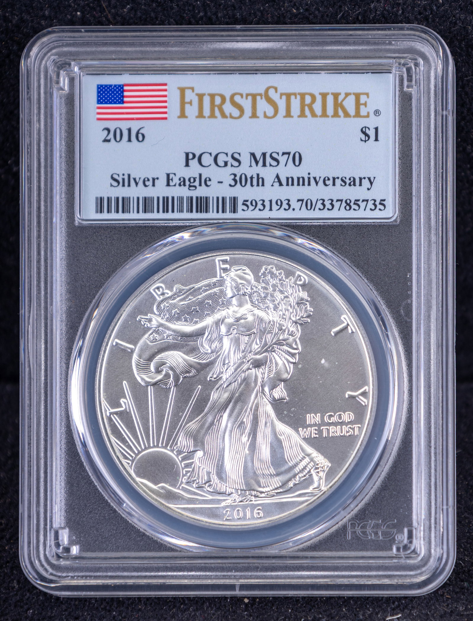 2016 PCGS MS70 Silver Eagle 30th Anniversary Coin: 2016 American Silver Eagle coin graded MS70 by PCGS, featuring the 'First Strike' designation for being delivered within the first 30 days of initial release. Encased in PCGS protective holder with 30