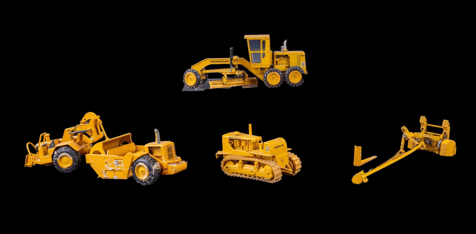 Vintage Gescha Die Cast Caterpillar Toys: A collection of three vintage Gescha die cast Caterpillar construction toys, c. 1970s Germany.