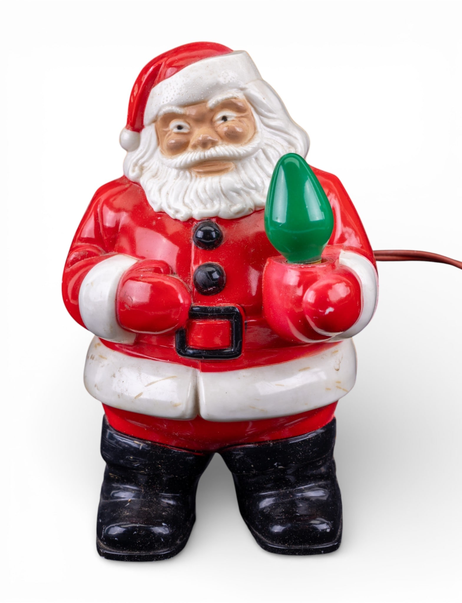 Royalite Hard Plastic Santa Claus Light: Vintage Royalite hard plastic Christmas Santa Claus figurine, likely dating from the 1940s or 1950s. Features Santa holding a green light bulb, with an attached electric cord for illumination. Measure