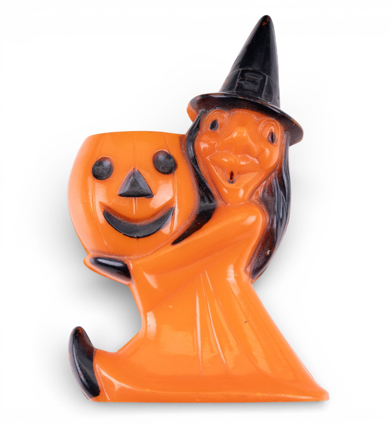 Vintage Rosbro Plastics Witch Candy Container: Vintage hard plastic Halloween candy container by Rosbro Plastics, circa 1950s, modeled as a witch in an orange dress and black hat holding a jack-o-lantern bucket.