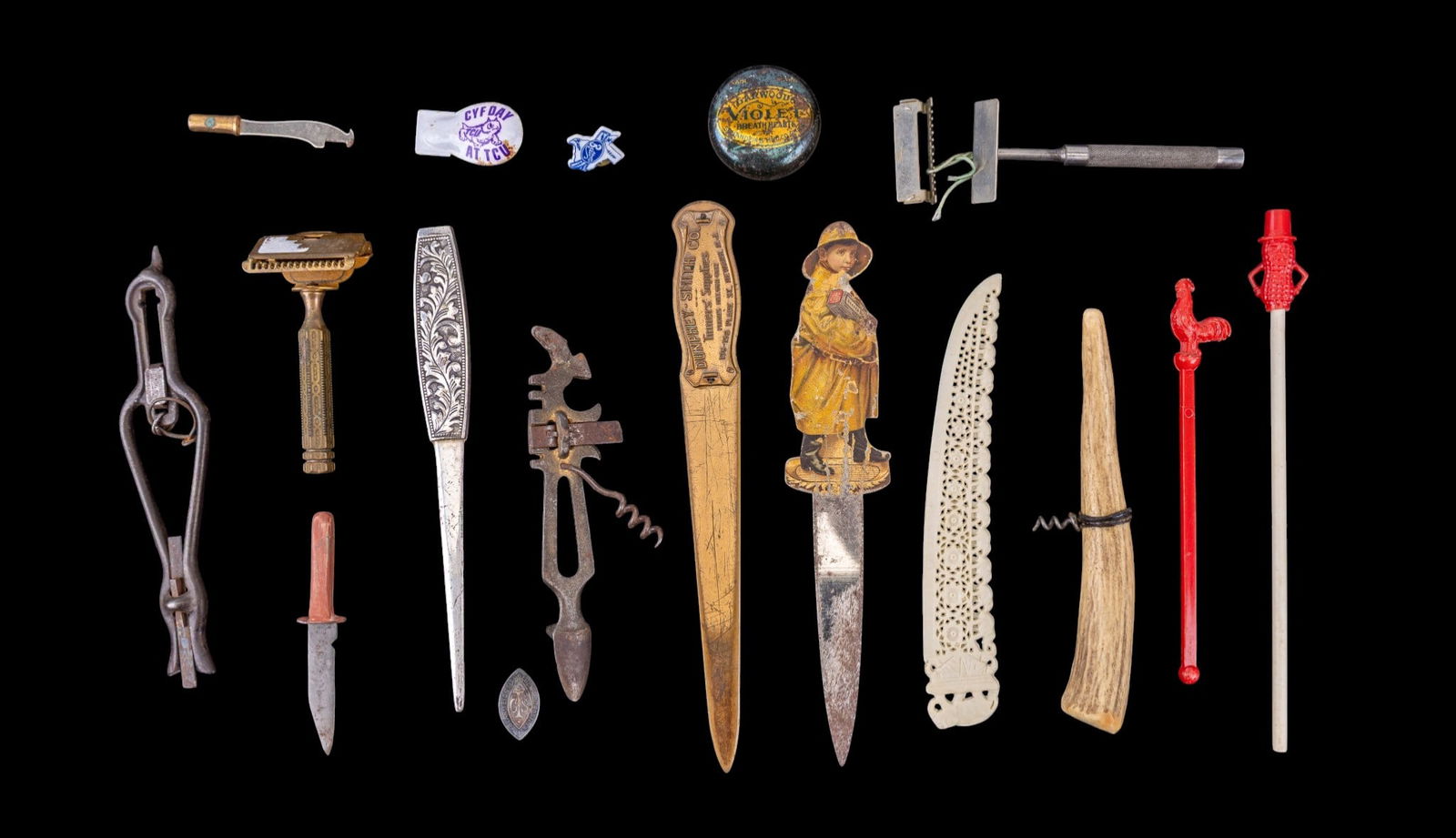 Letter Openers, Advertising, More: Antique and vintage novelty items including a carved letter opener with pierced floral and geometric decoration, a brass-tone letter opener marked "Dunphey-Smith Co.", a brass safter razor, an