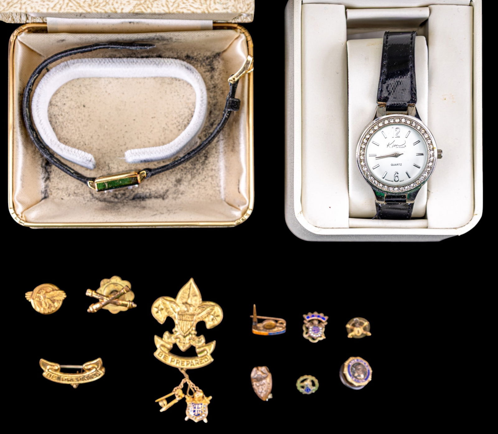 Seiko Ladies Wrist Watch and Insignia: A Seiko ladies wrist watch featuring a dark green dial, note band will need replaced, #250195, a Kim Rogers designer costume ladies wrist watch featuring a rhinestone halo around the dial with origina