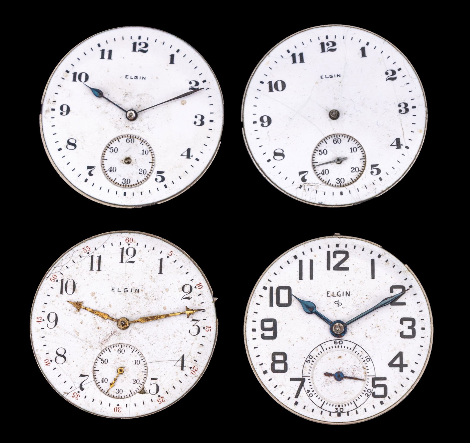 Vintage Elgin Pocket Watch Movements: A collection of four vintage Elgin pocket watch movements featuring porcelain dials, note one is 15 jewels. Dial diam. are all 1.625". Note some loss. Movement numbers as seen in photos.