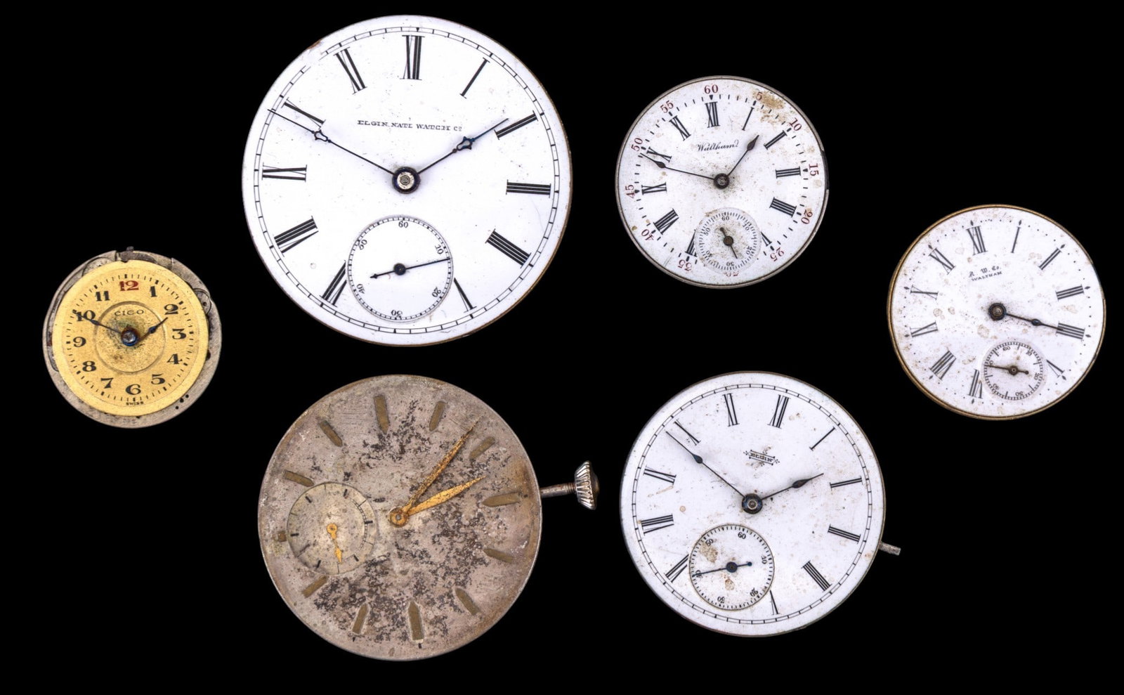 Elgin, Waltham, Cico Pocket Watch Movements: Three Elgin pocket watch movements, two Waltham movements, and one by Cico, featuring metal and porcelain dials. Dial diam range from .875" to 1.75". Names and style/edition numbers as seen in photos.