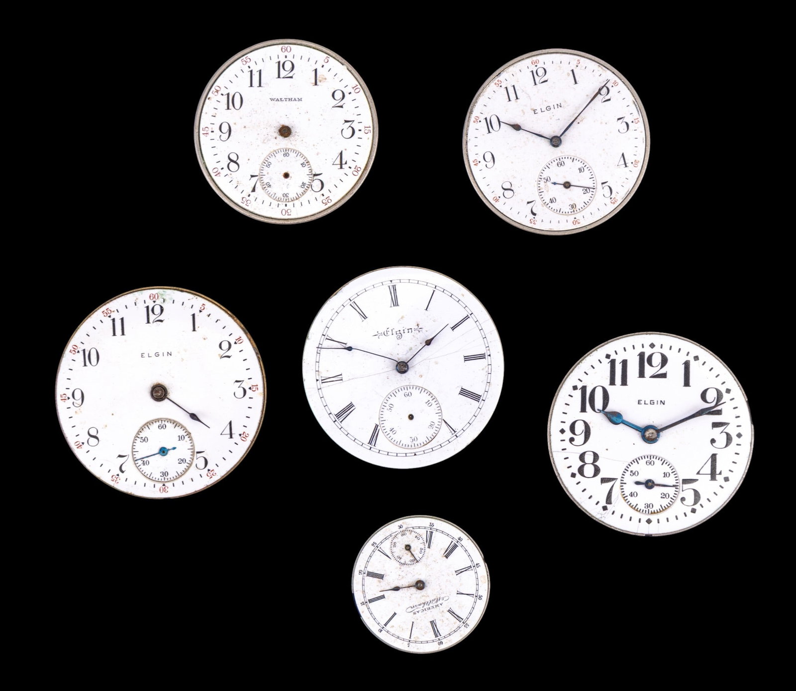 Elgin and Waltham Pocket Watch Movements: Four Elgin pocket watch movements and two Waltham movements with porcelain dials. Dial diam range from 1.125" to 1.75". Names and style/edition numbers as seen in photos.