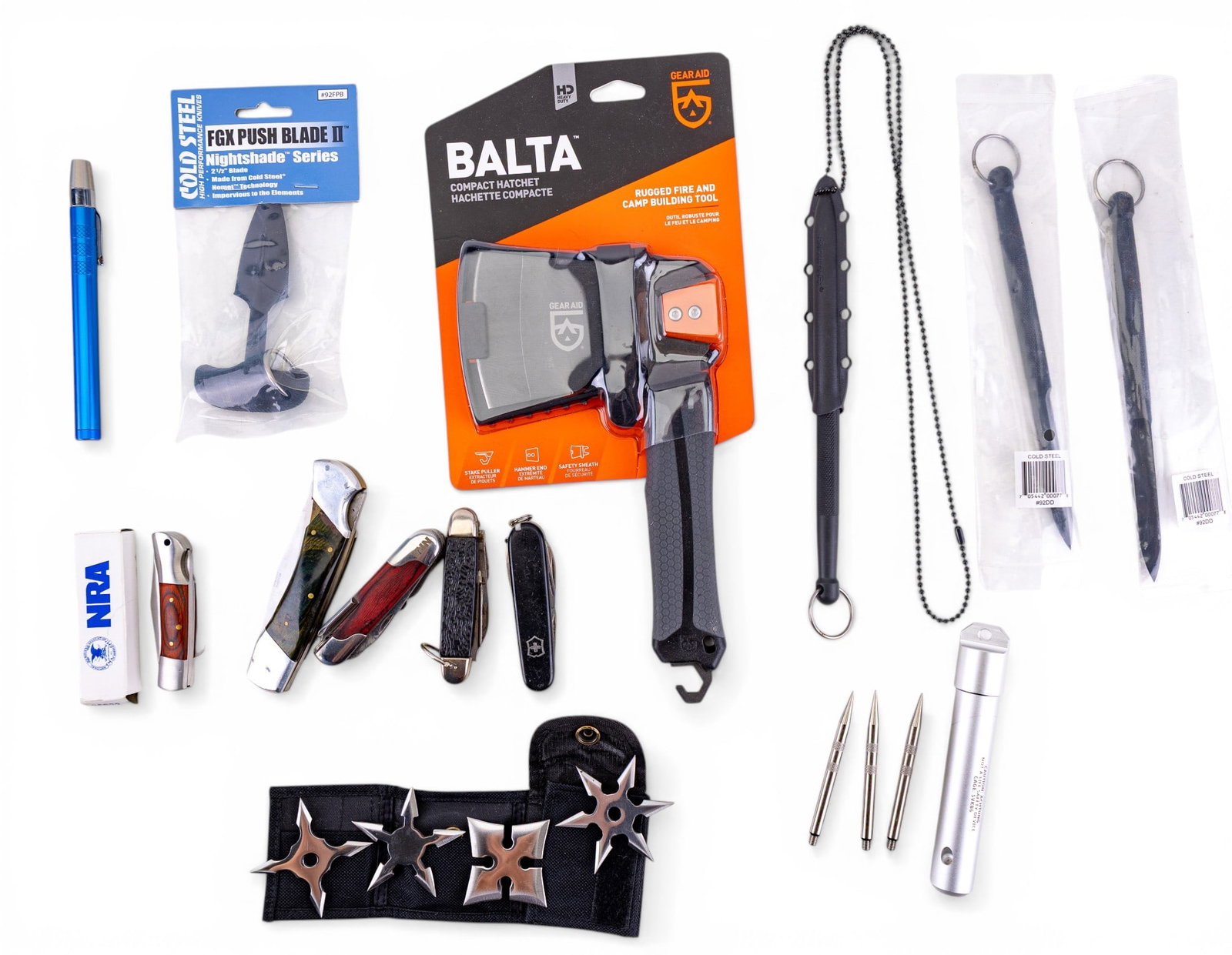 Pocket, Other Knives, Tools w/ Darts: A collection of self defense items including spring loaded window spike, a taser flashlight, three Secure-Ex Delta Darts, Cold Steel FGX push blade new in packaging, Swiss Army knives including logos