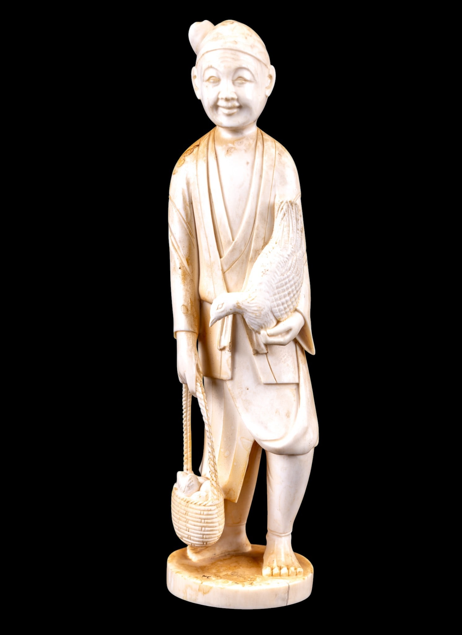 Chinese Carved Natural Material Figurine: A carved natural material Chinese figurine depicting a man with chickens, measures approx. 8" H. Marked on base. MUST BE SOLD IN PA ONLY- Item can only be sold to Pennsylvania residents inside the