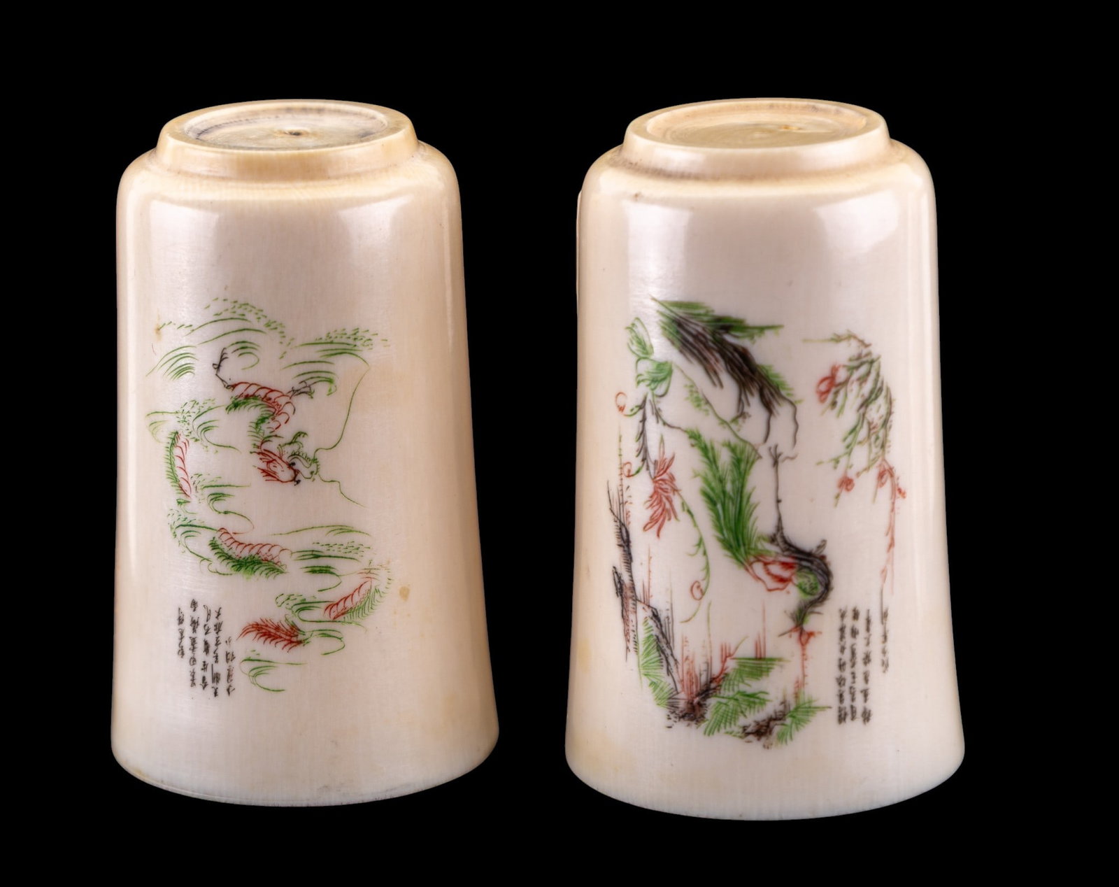 Pair of Chinese Cups w/ Figural Scenes: Pair of Chinese cups carved from natural material of tapered cylindrical form. Each is decorated with hand-painted figural and landscape scenes accompanied by vertical calligraphy. Each measures appro