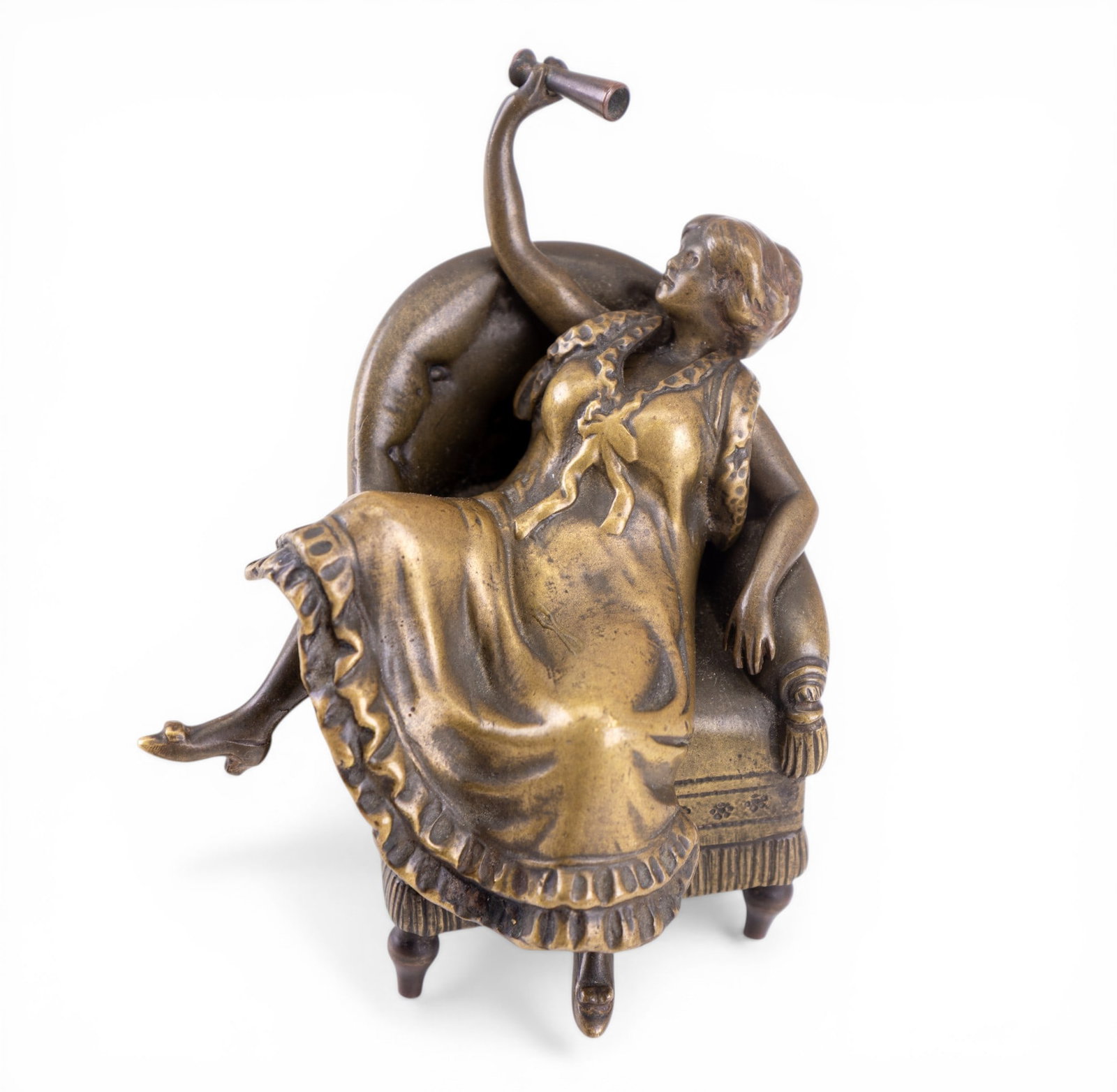 Early 20C Austrian Erotic Bronze Sculpture: Austrian cold-painted bronze depicting a seated female figure in chair, raising a drinking vessel, with removable dress revealing an erotic nude figure beneath. Dress is a seperate fitted bronze