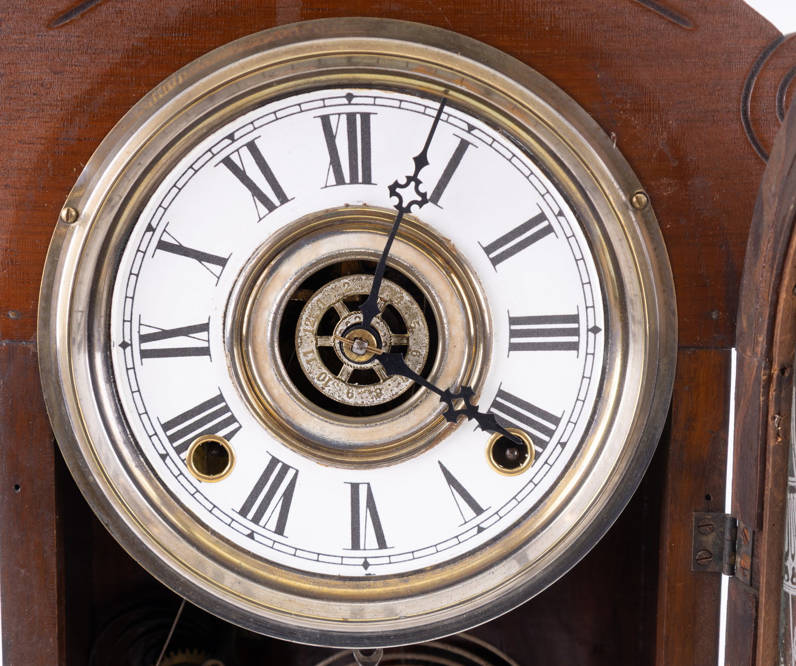 Calypso Wm. Gilbert Gingerbread Clock: The Calypso design gingerbread mantle clock by Wm. Gilbert featuring a paper dial, reverse painted design on the glass, key, and pendulum. Note broken tip at the top. Untested, measures approx. 13" W