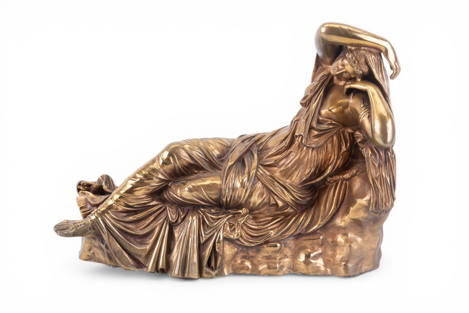 Bronze Classical Maiden Clock Topper: Cast bronze figural clock topper depicting a reclining classical maiden in flowing drapery, mounted on a naturalistic base. Signed along the edge "F. Barbedienne Fondeur". Finely modeled with detailed