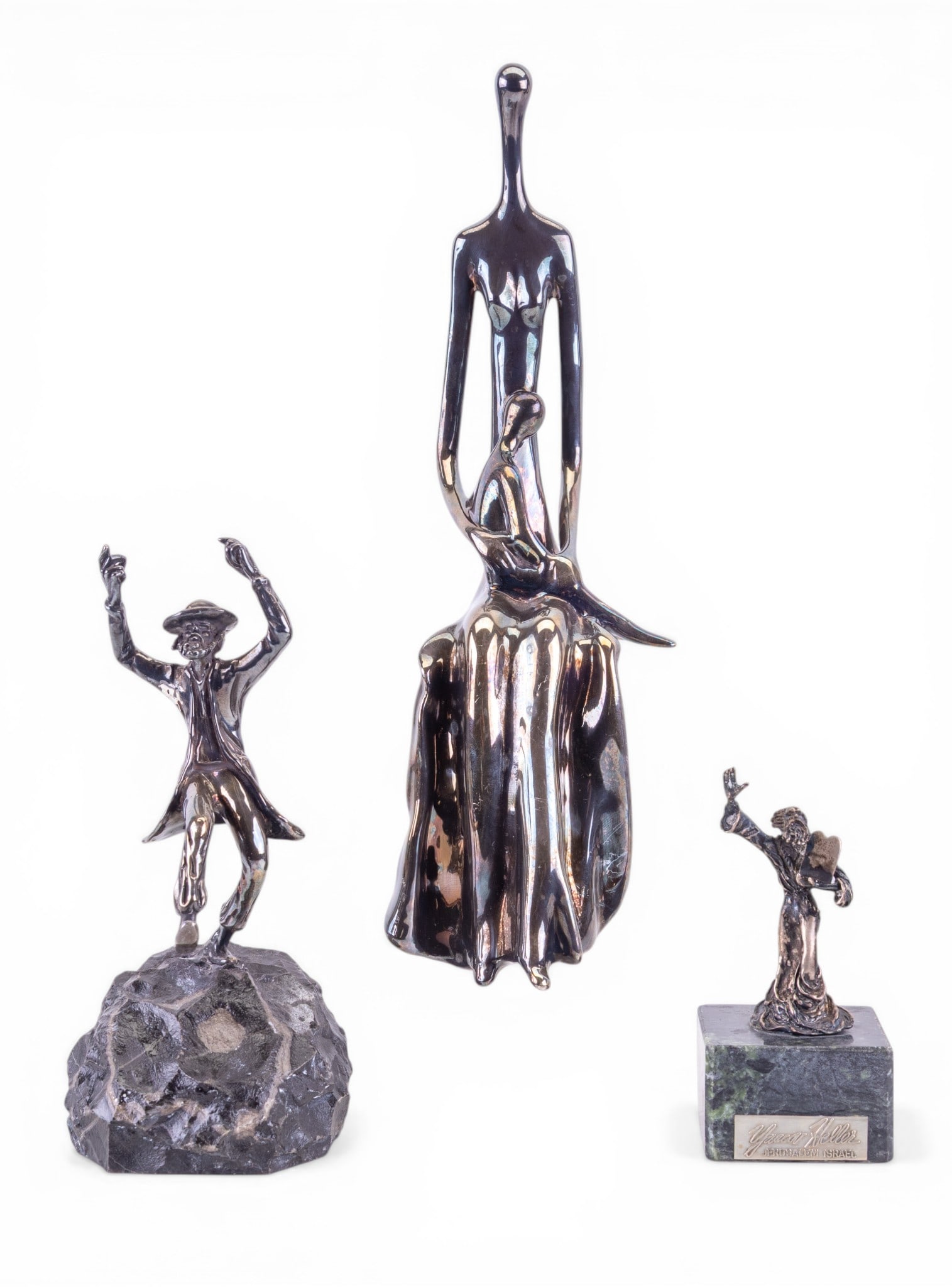 Sterling Yaacov Heller and Ruth Bloch Figurines: Two sterling silver marble mounted figurines, one depicting Moses and the other depicting a Rabbi, both signed by Yaacov Heller (American 1941-) measurements range from 4" to 6.25" H, and a modern
