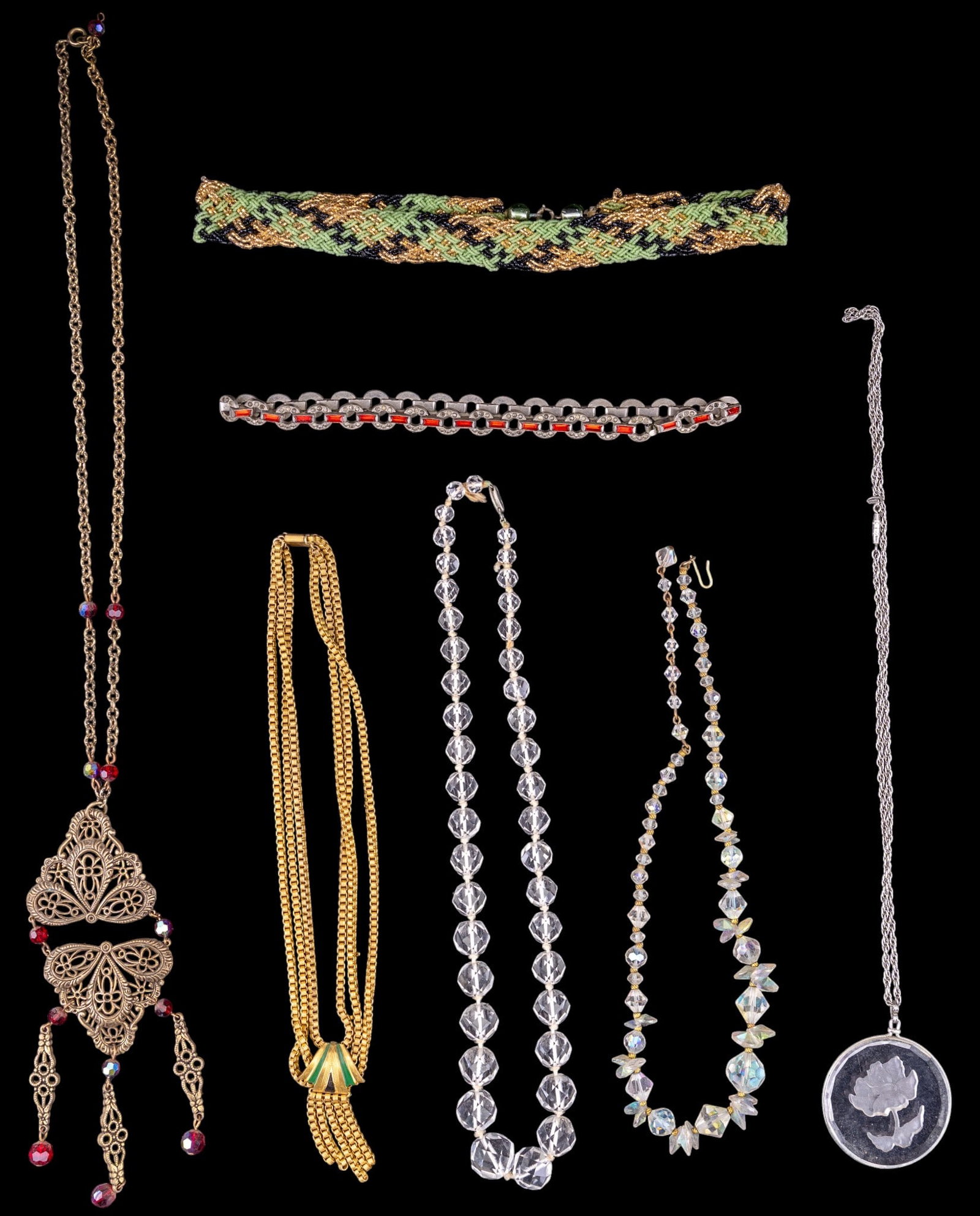 Vintage Costume Jewelry: Includes crystal necklaces, a clear glass rose pendant, and brass filigree with red stone.