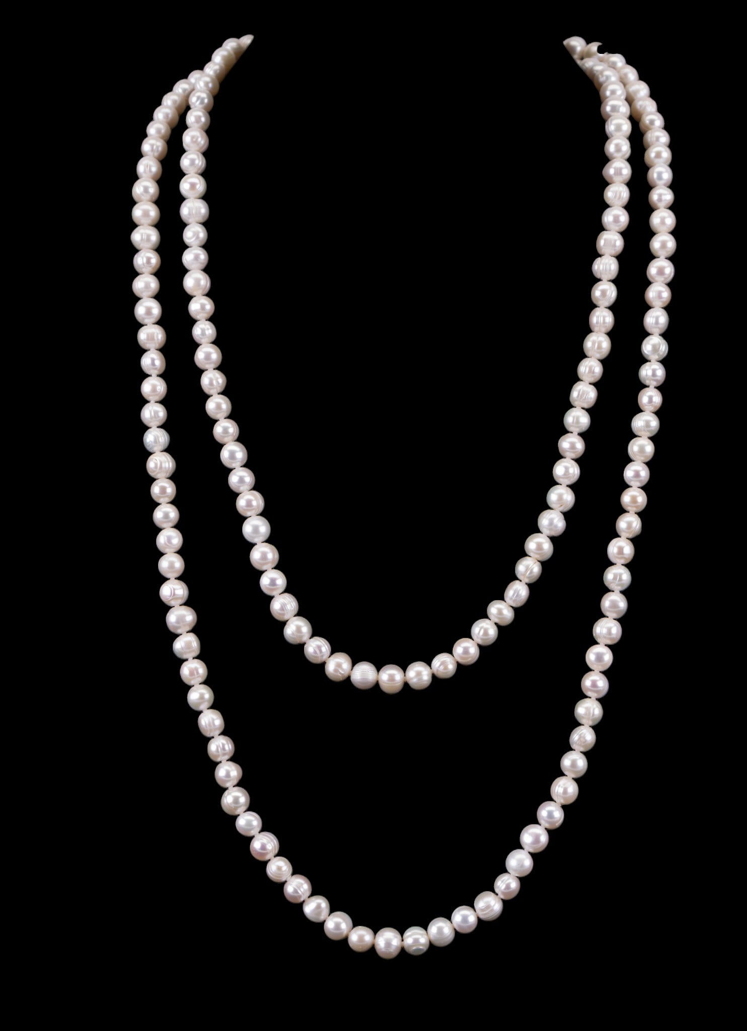 Sterling and Pearl Necklace: Long white pearl necklace with sterling clasp.