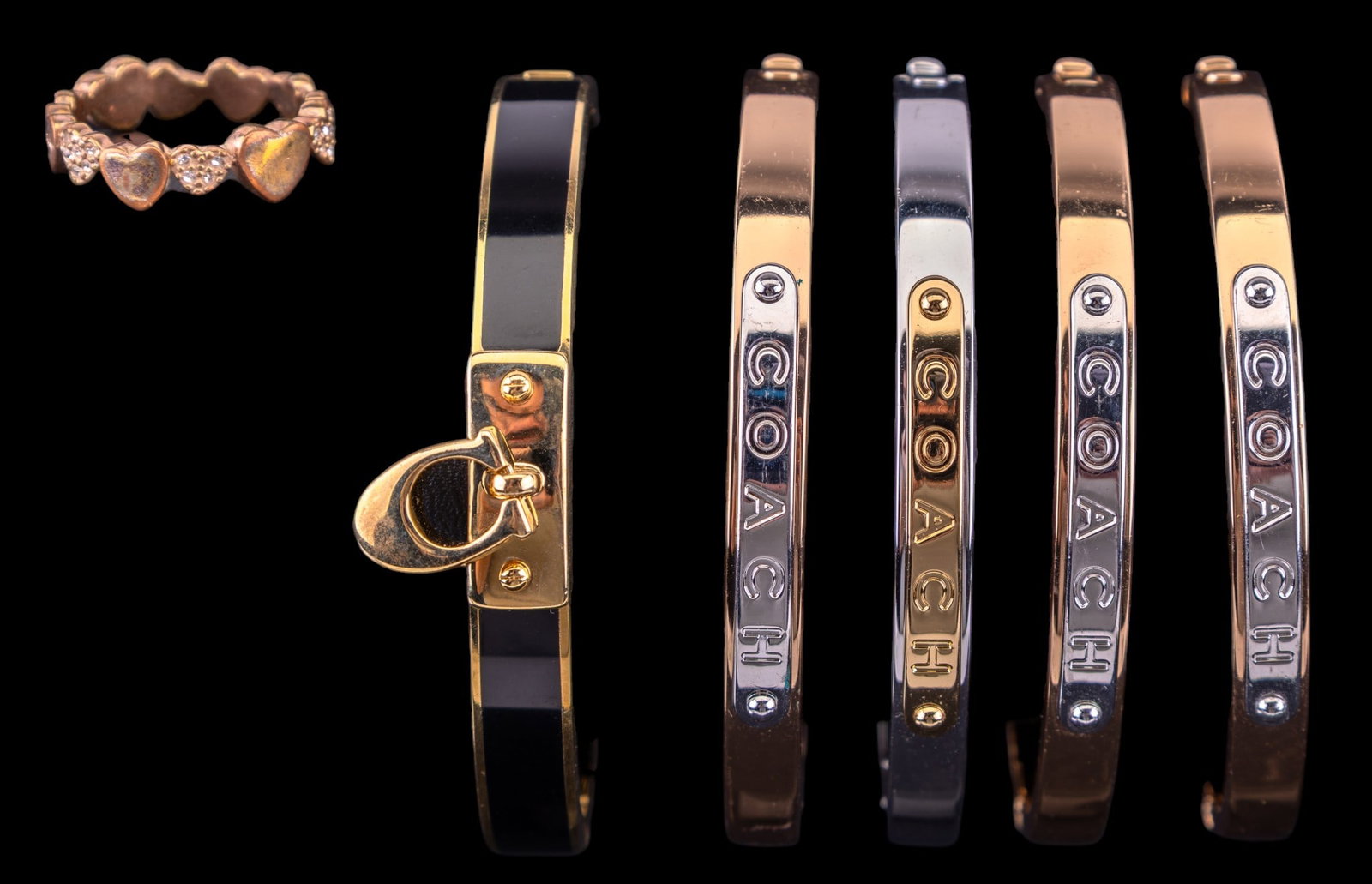 Coach Jewelry: Includes five gold-tone Coach bangle bracelets and a Coach heart ring.