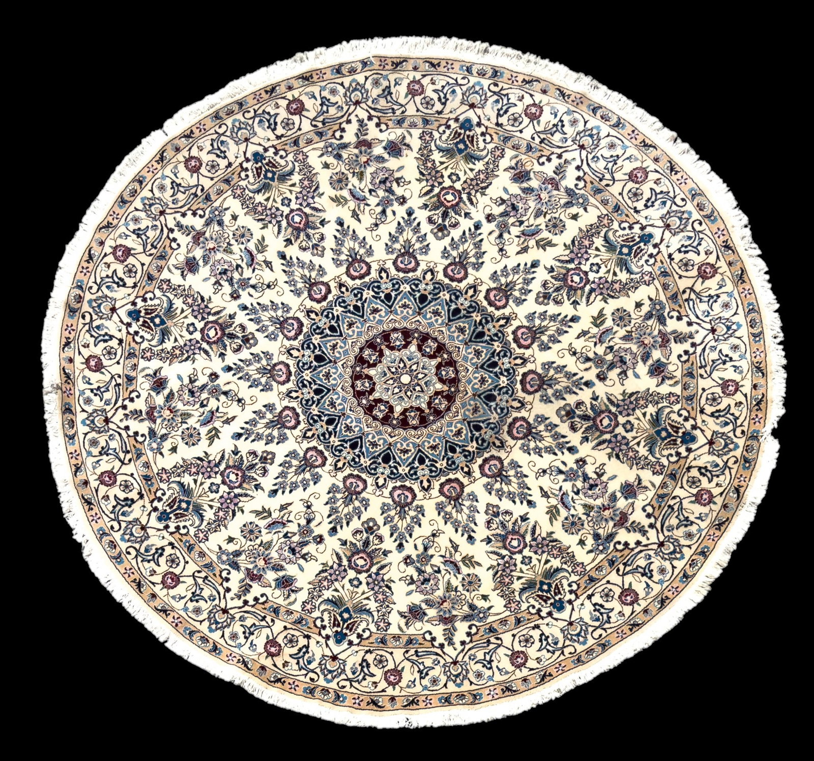 Round Persian Rug ~8' Diameter: Circular form hand knotted Persian area rug with blue and pink floral motifs against a cream tone ground. Measures approx. 8'1" Diameter.