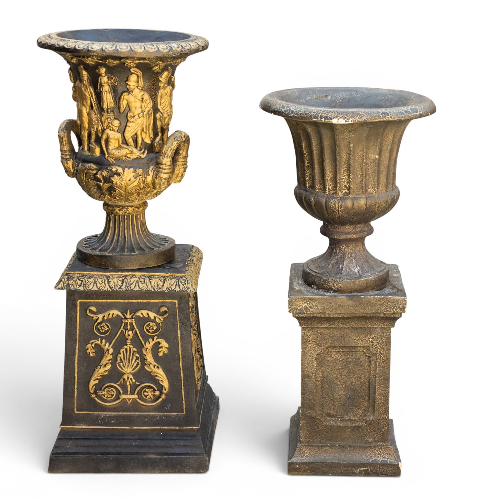 Composite Decorative Urns (2): Two composite urns, including one gilt, two-piece design measuring approximately 38? tall with a base 14.25? square at its widest point, featuring ornate relief details. The second urn is a solid, sin