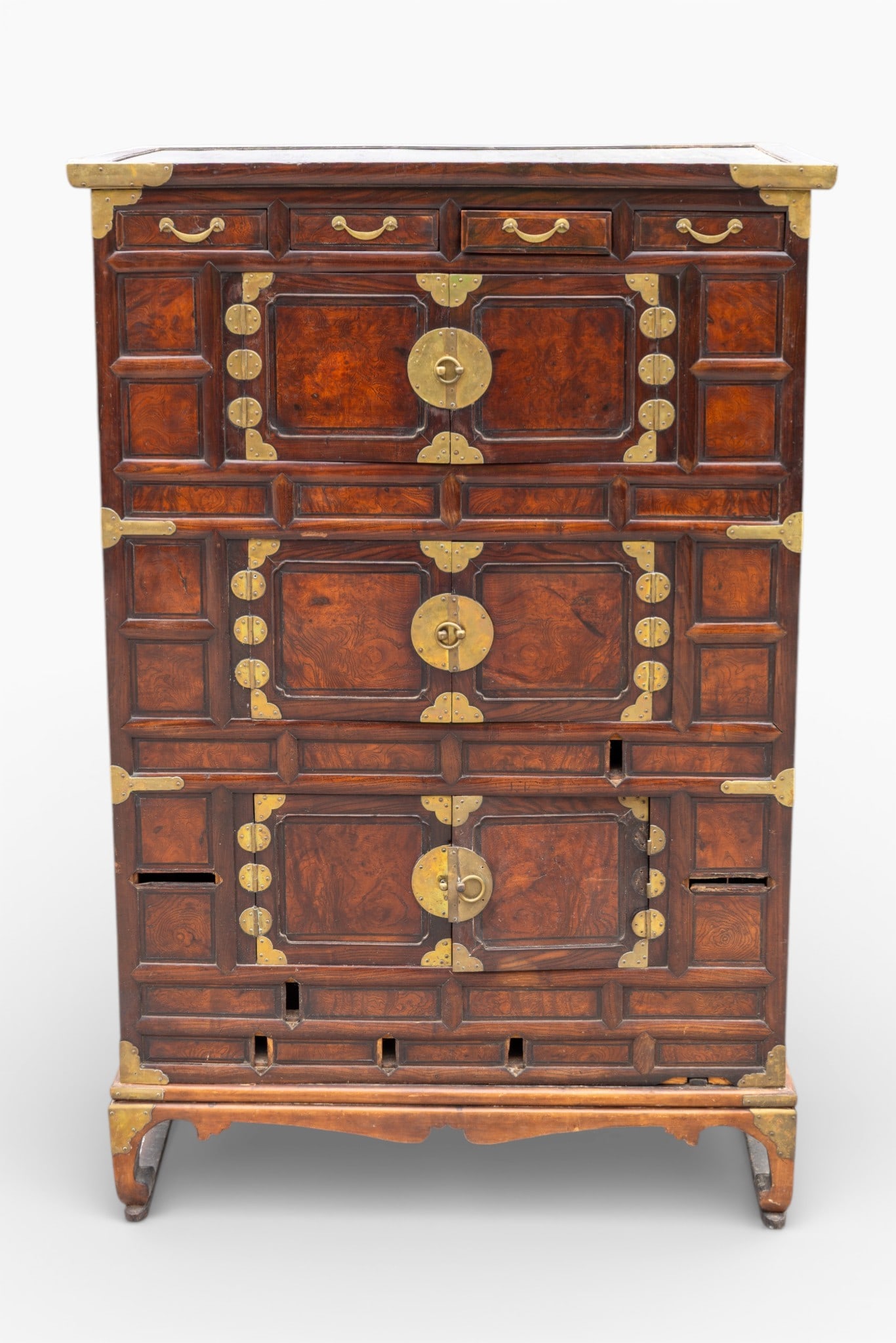 Antique Korean 4 Drawer 3 Door Chest on Frame: Antique chest on frame with 4 small top drawers over 3-story storage. Brass pulls, hinges and decoration. Measures approx. 63.5" H x 42.5" W x 19.75" D.