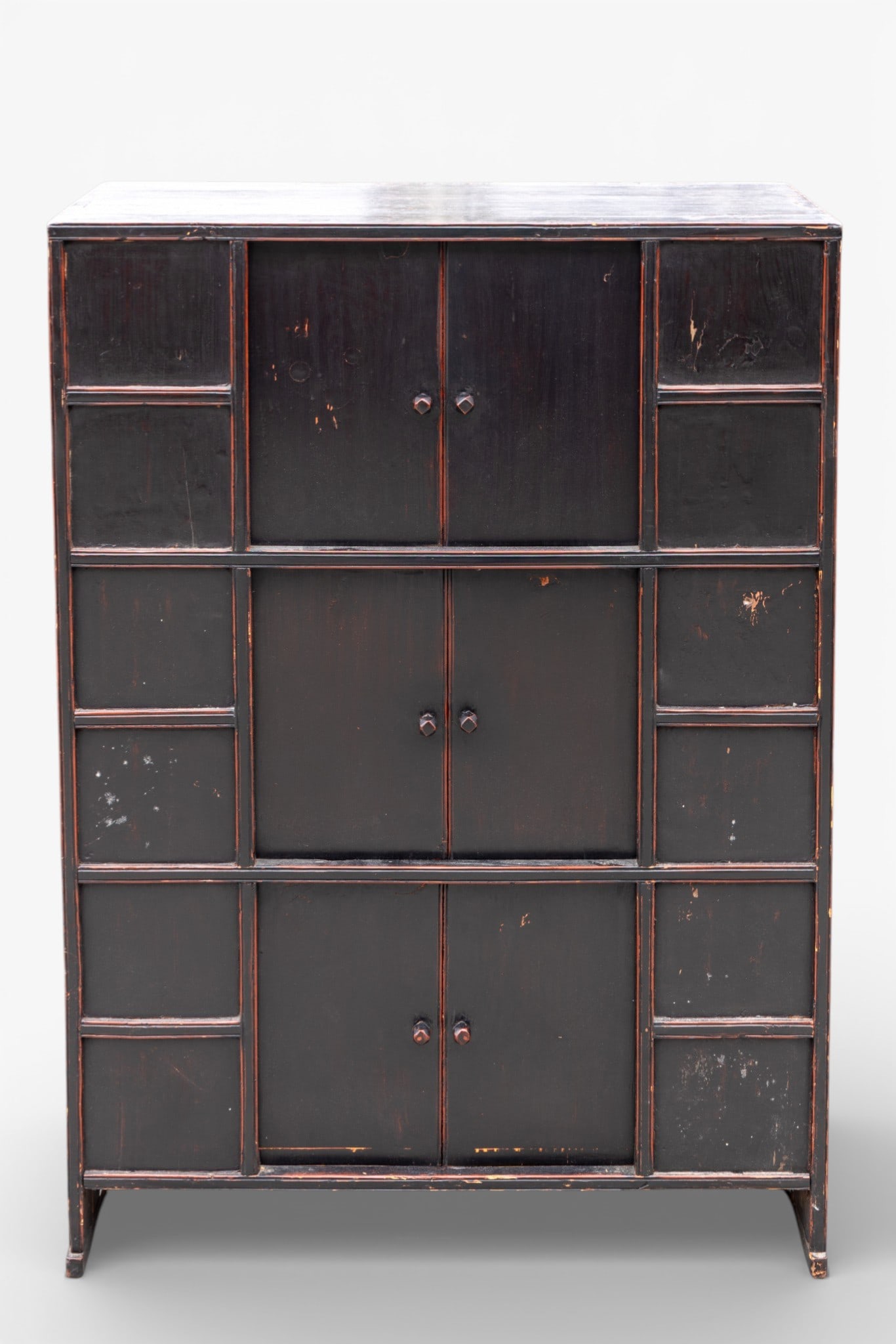 19th C Korean 3-Story Book Chest / Cabinet: A Korean / Asian three-story book chest / kitchen cabinet from the 19th century, featuring a black finish. The chest is divided into three stacked compartments with sliding doors. Measures approx. 43.
