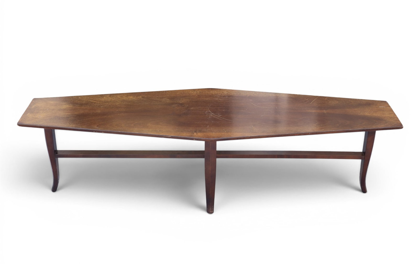 Italian Designer Coffee Table: Italian made coffin form table featuring a unique elongated hexagonal shape. Constructed from maple with a walnut burl per label. The underside has labels indicating its origin and possibly offering f