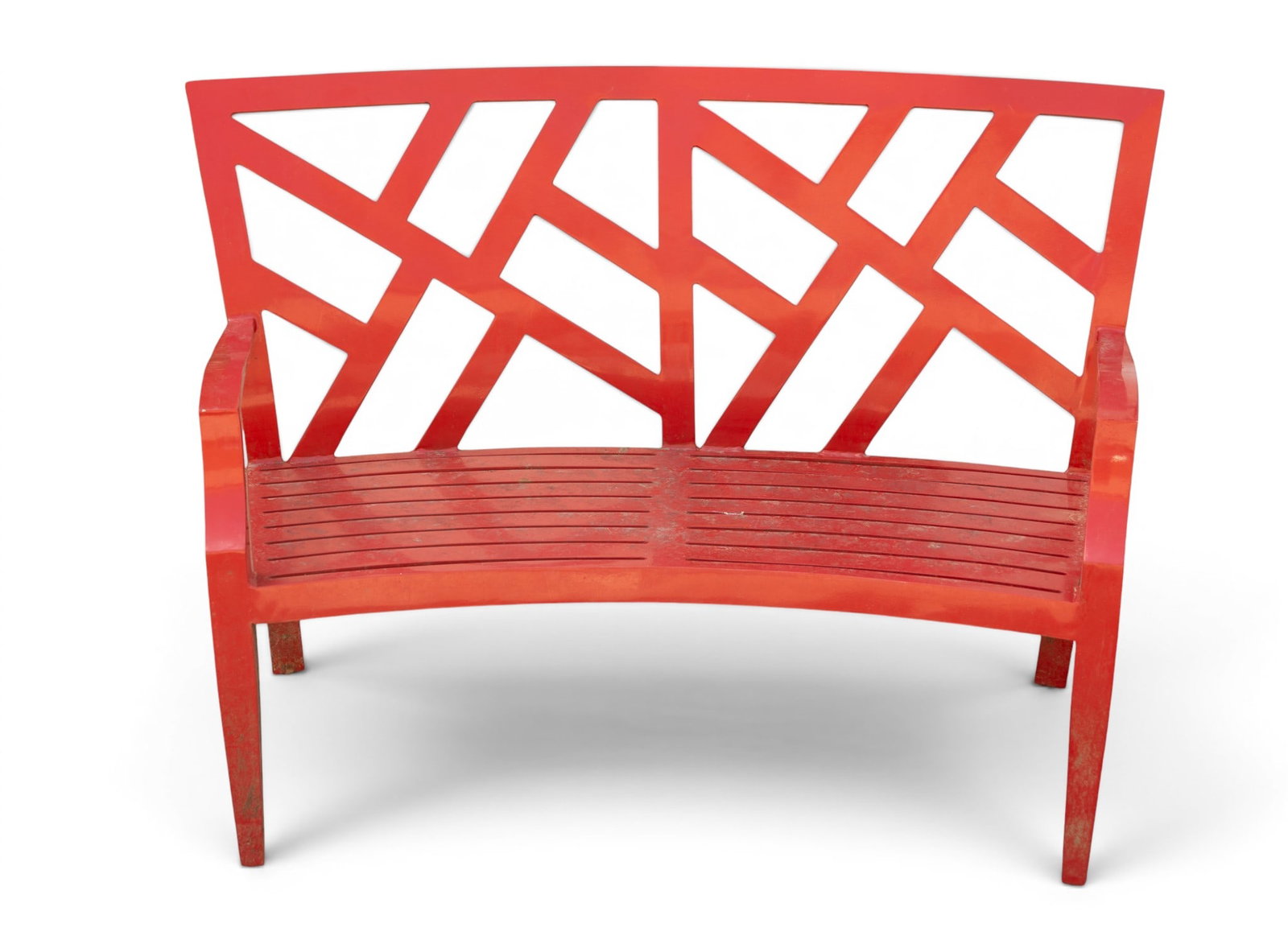 Cast Metal Bench by Woodard, Ruggiero Collection: Cast metal bench in red from the Woodard Joe Ruggiero Collection. Features a geometric openwork backrest design and slatted seat with integrated armrests. Stamped with maker's label on the frame. The