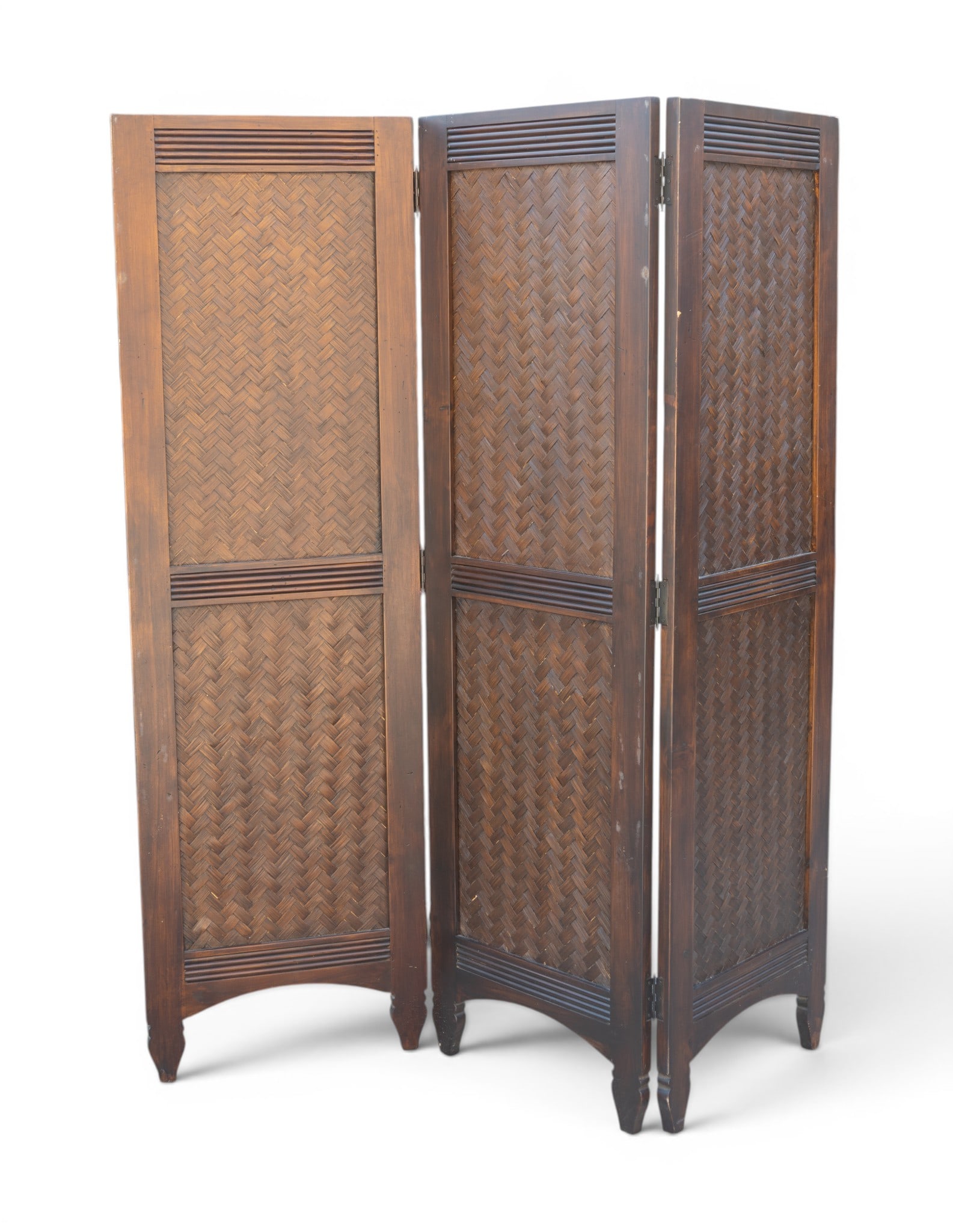Three Panel Wood Room Divider with Woven Design: Three-panel wood room divider featuring a herringbone-patterned woven insert. Panels are joined with hinges, allowing for foldable configuration. Made of stained wood with a rich tone. Each panel