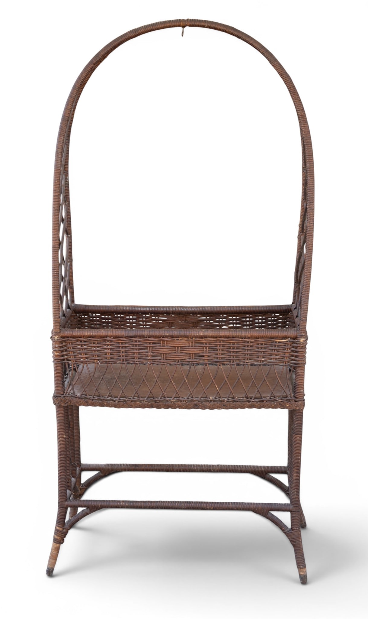 Antique Victorian Wicker Planter Box Stand: An antique Victorian painted wicker planter box stand featuring a hook for hanging in the arch. Measures approx. 28" W x 14" D x 63" H.