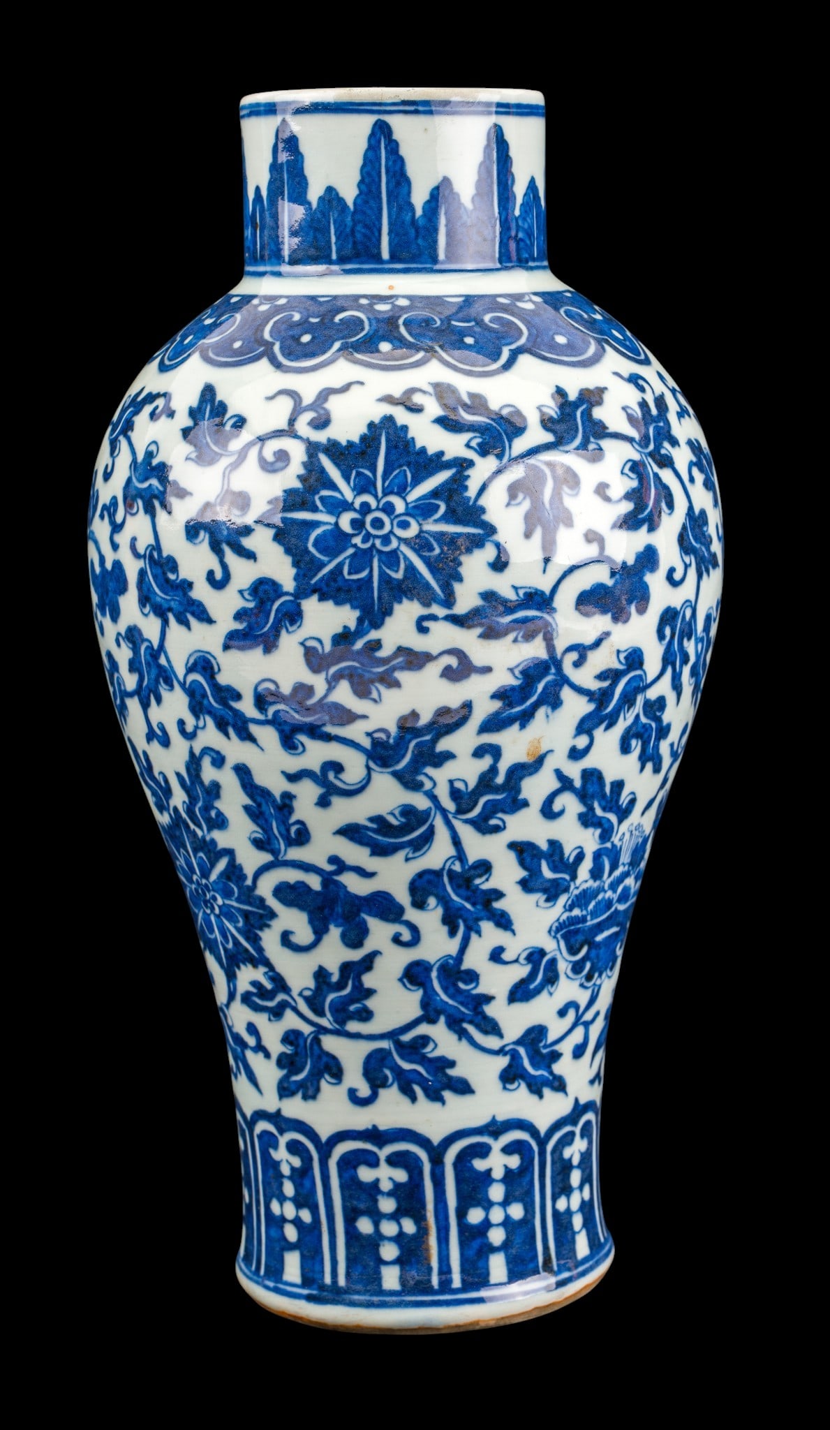 Chinese Blue & White Baluster Form Porcelain Vase: Chinese porcelain vase of baluster form, decorated in under glaze blue with dense scrolling floral and foliate motifs throughout the body. Large hairline crack present on side of vase (see photos). Me
