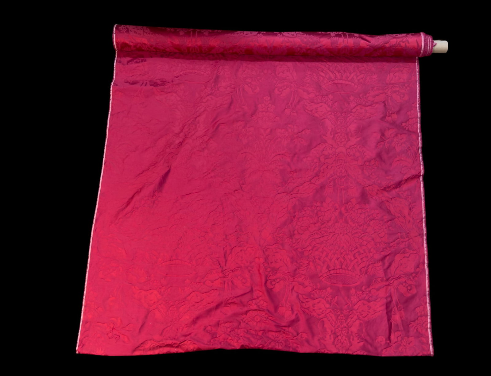 Scalamandre "Gabriel" Red Damask Fabric Bolt: A bolt (small rectangular amount taken out as seen) of Scalamandre "Gabriel" pattern red damask fabric measuring approx. 24 feet long by 5 feet in width. Also includes two extra pieces of the same fab