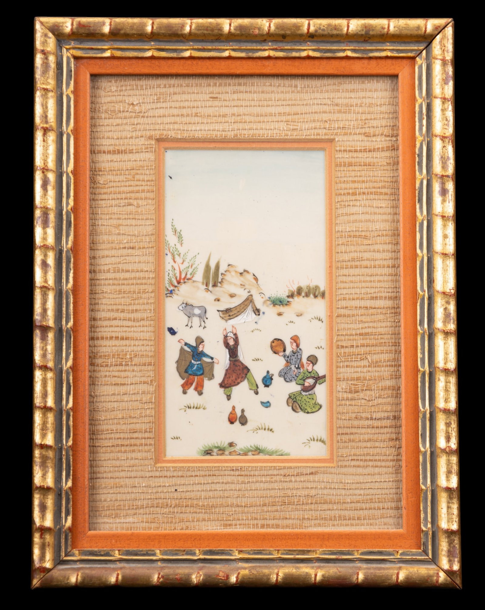 Antique Indo Persian Celluloid Painting: An antique framed Indo Persian painting on celluloid depicting people playing music and dancing in a field. Gilt bamboo style frame. Measures approx. 8.5" W x 11.5" H.
