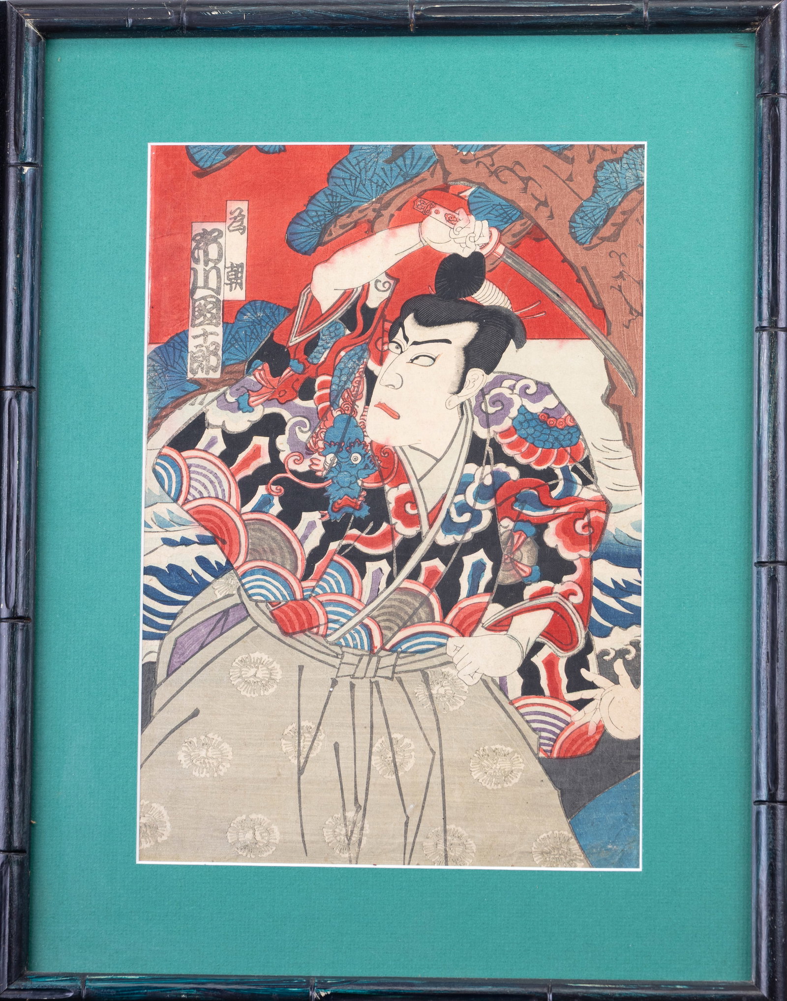 Toyohara Kunichika (1835-1900) Nishiki-e Ukiyo-e: A framed nishiki-e kabuki actor Ukiyo-e woodblock print c. Meiji era by Toyohara Kunichika (Japanese 1835-1900). Measures approx. 15" W x 19" H.