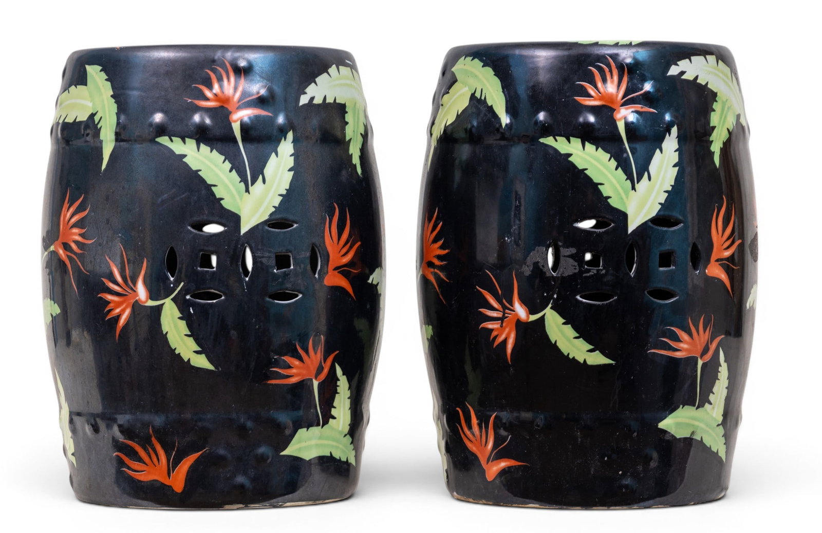 Contemporary Chinese Style Garden Stools (2): A matching pair of contemporary Chinese style ceramic garden stools featuring a bird of paradise flower motif on a dark black/blue ground. Both measure approx. 13" diam x 17.5" H.