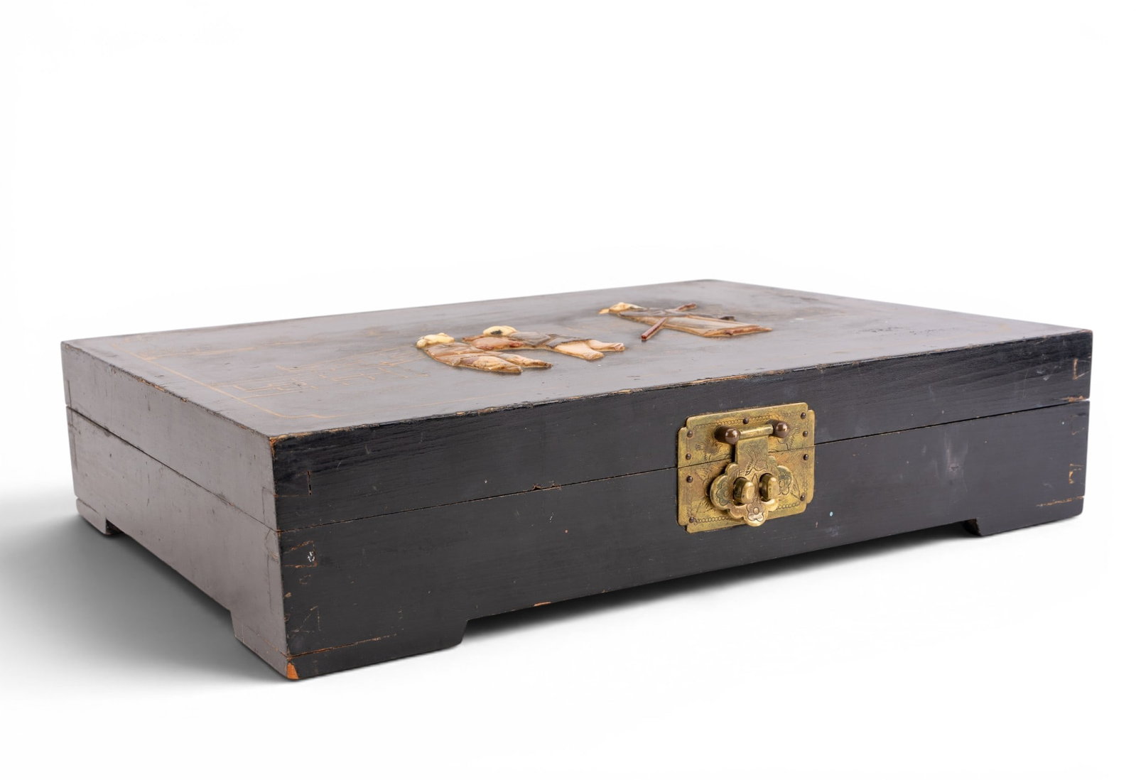 Early Chinese Lacquerware Jewelry Box: A large Chinese lacquerware jewelry box featuring carved soapstone and natural material relief figures, green silk jewelry compartments, dovetail corners, and etched brass escutcheon. Note some loss. 