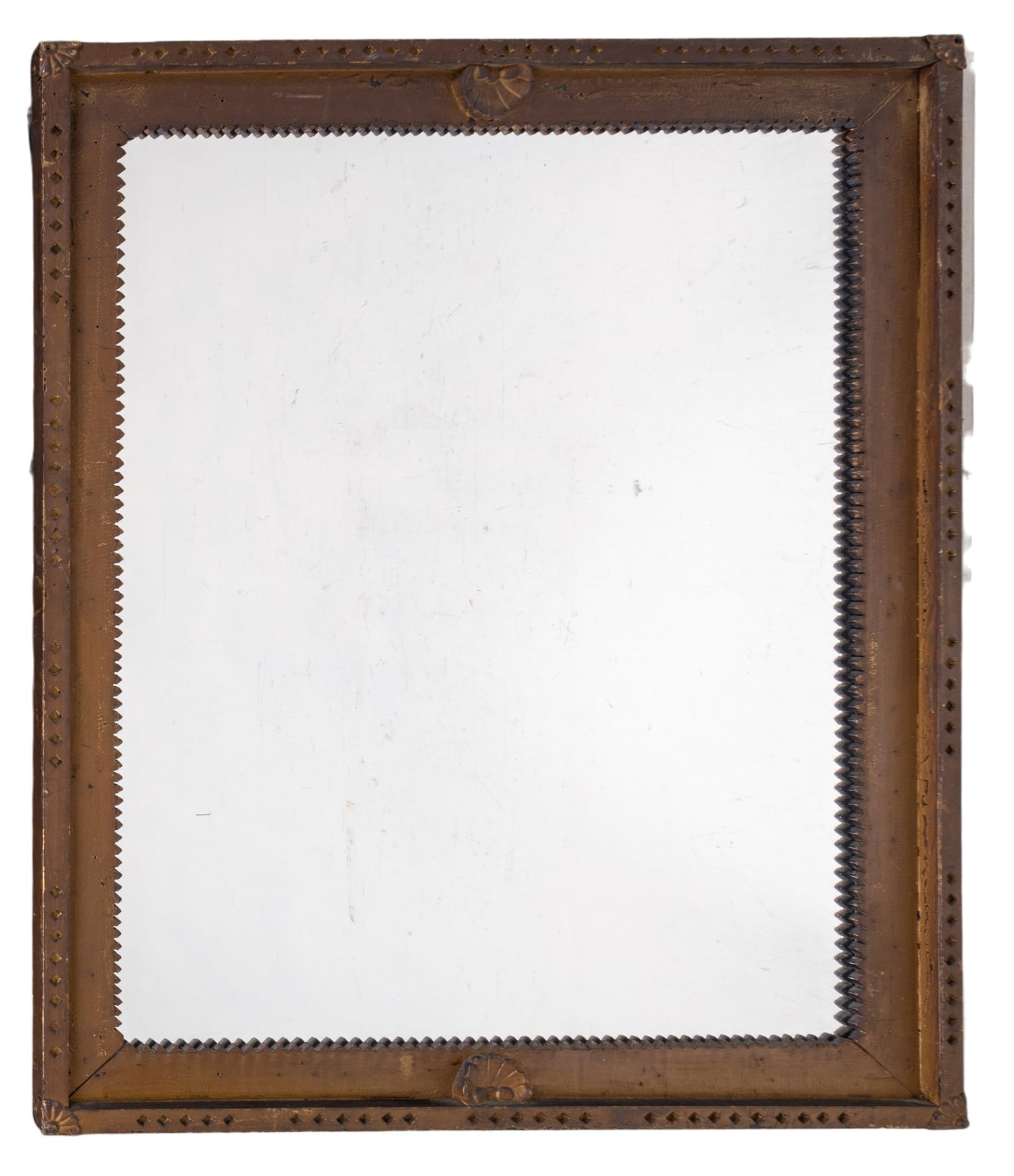 Antique Mission Tramp Style Carved Wood Mirror: An antique Mission Tramp style carved wood wall mirror, featuring brass corners. Measures approx. 34.5" W x 42.5" H.